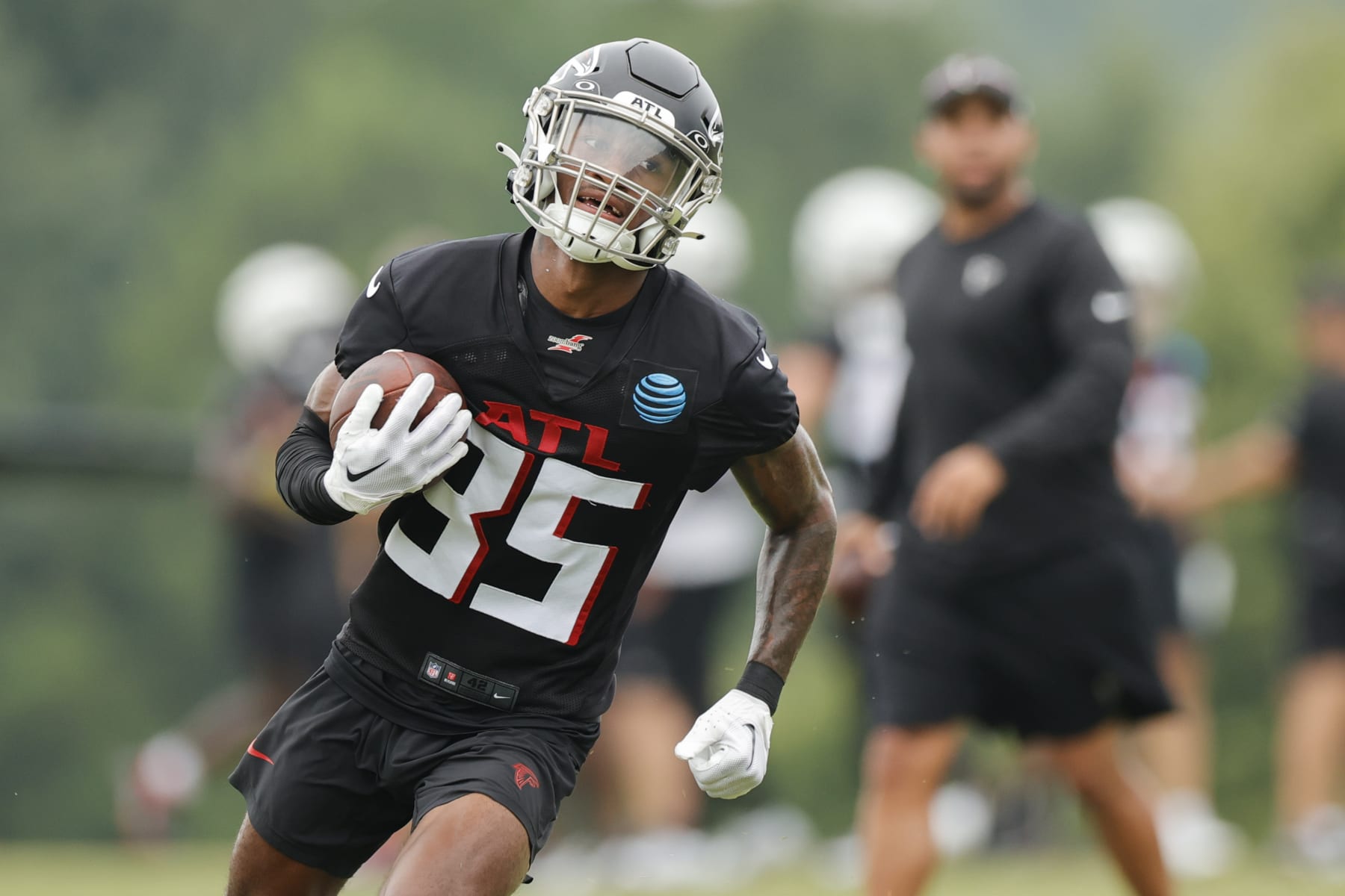 Atlanta Falcons cornerback Natrone Brooks (35) runs a drill during the NFL football team's training camp, Saturday, July 29, 2023, in Flowery Branch, Ga. (AP Photo/Alex Slitz)