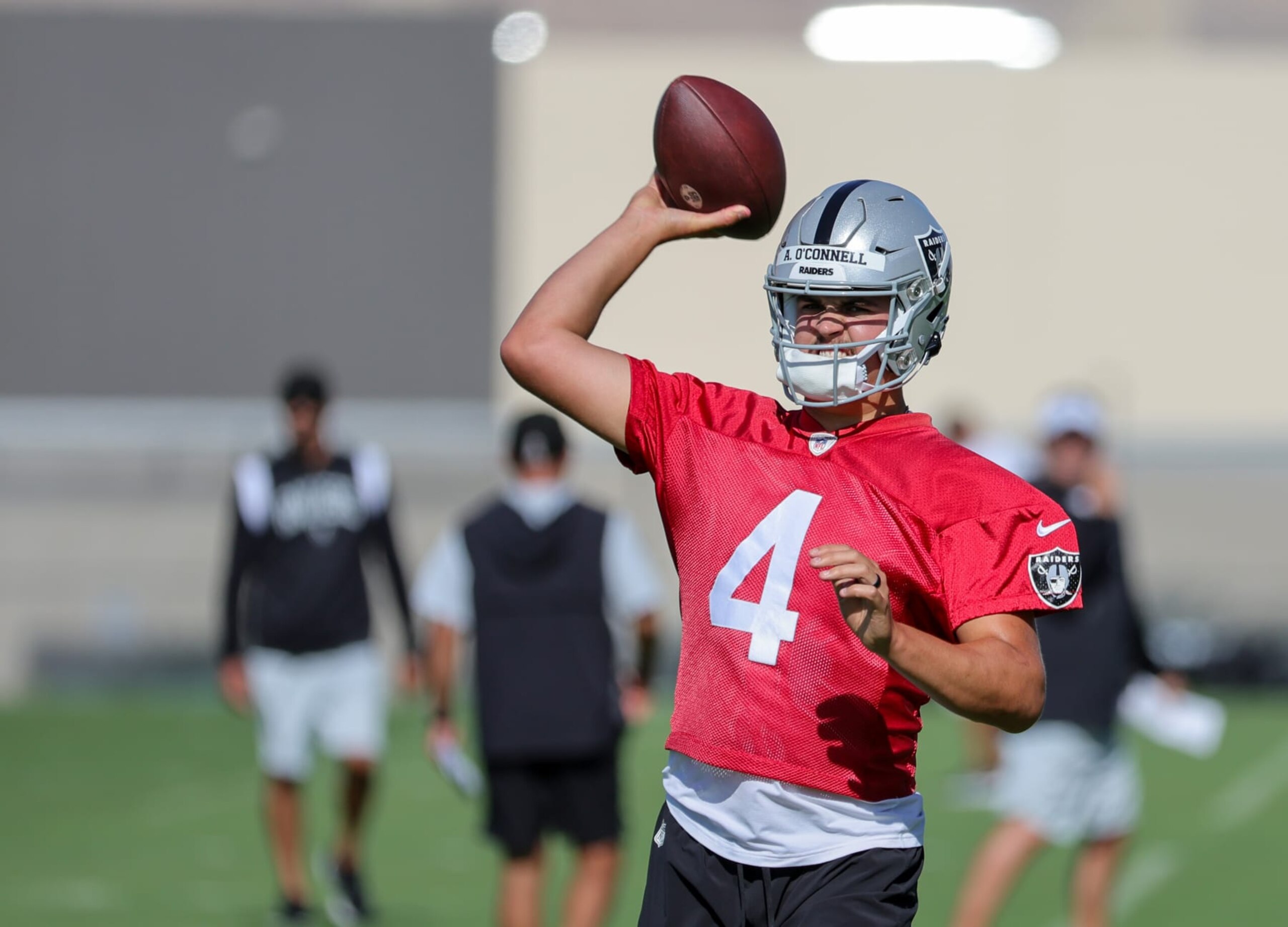 HENDERSON, NEVADA - JULY 26: Quarterback Aidan O'Connell #4 of the Las Vegas Raiders throws during the first practice of the team's training camp at the Las Vegas Raiders Headquarters/Intermountain Healthcare Performance Center on July 26, 2023 in Henderson, Nevada. (Photo by Ethan Miller/Getty Images)