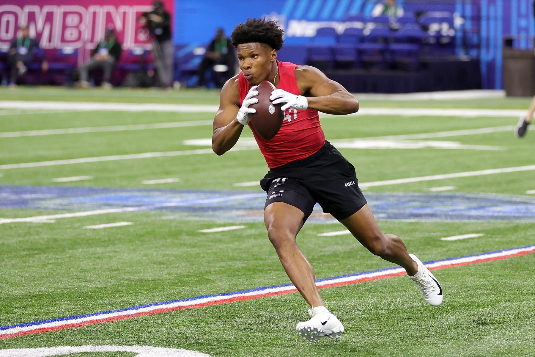 INDIANAPOLIS, INDIANA - MARCH 04: Mitchell Tinsley of Penn State participates in a drill during the NFL Combine at Lucas Oil Stadium on March 04, 2023 in Indianapolis, Indiana. (Photo by Stacy Revere/Getty Images)