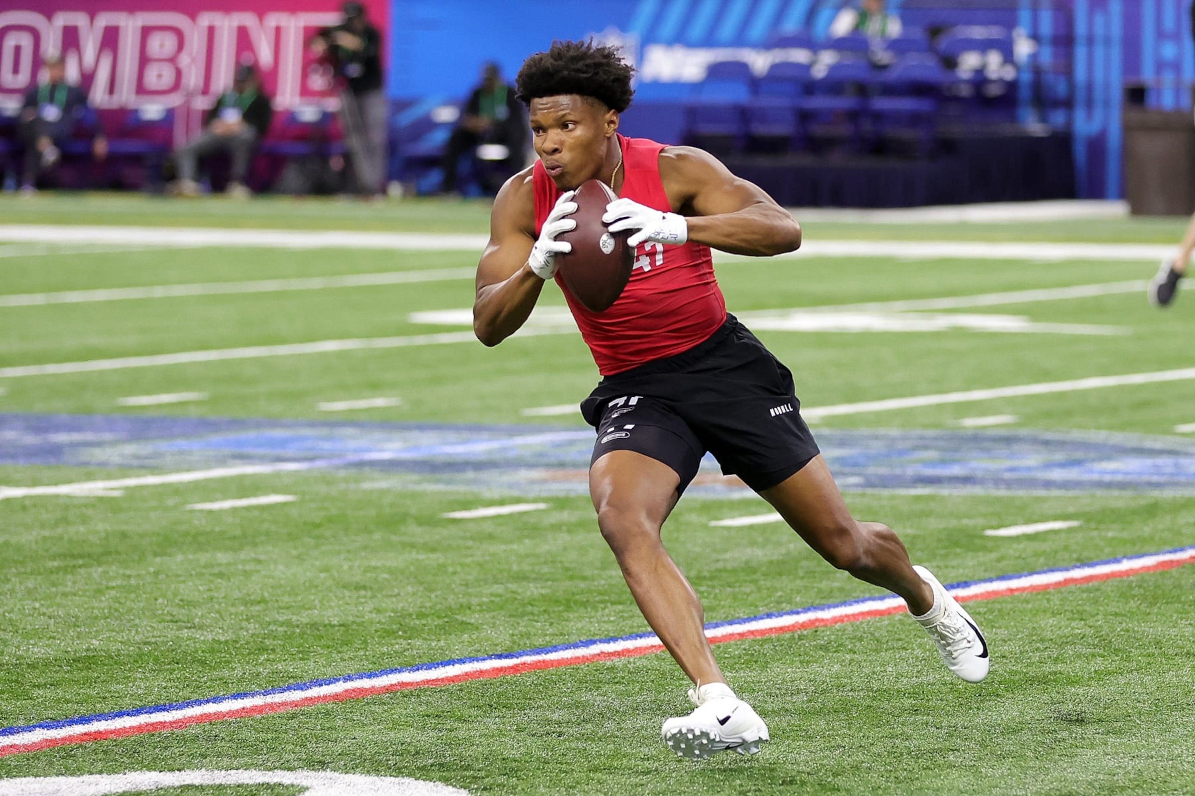 INDIANAPOLIS, INDIANA - MARCH 04: Mitchell Tinsley of Penn State participates in a drill during the NFL Combine at Lucas Oil Stadium on March 04, 2023 in Indianapolis, Indiana. (Photo by Stacy Revere/Getty Images)