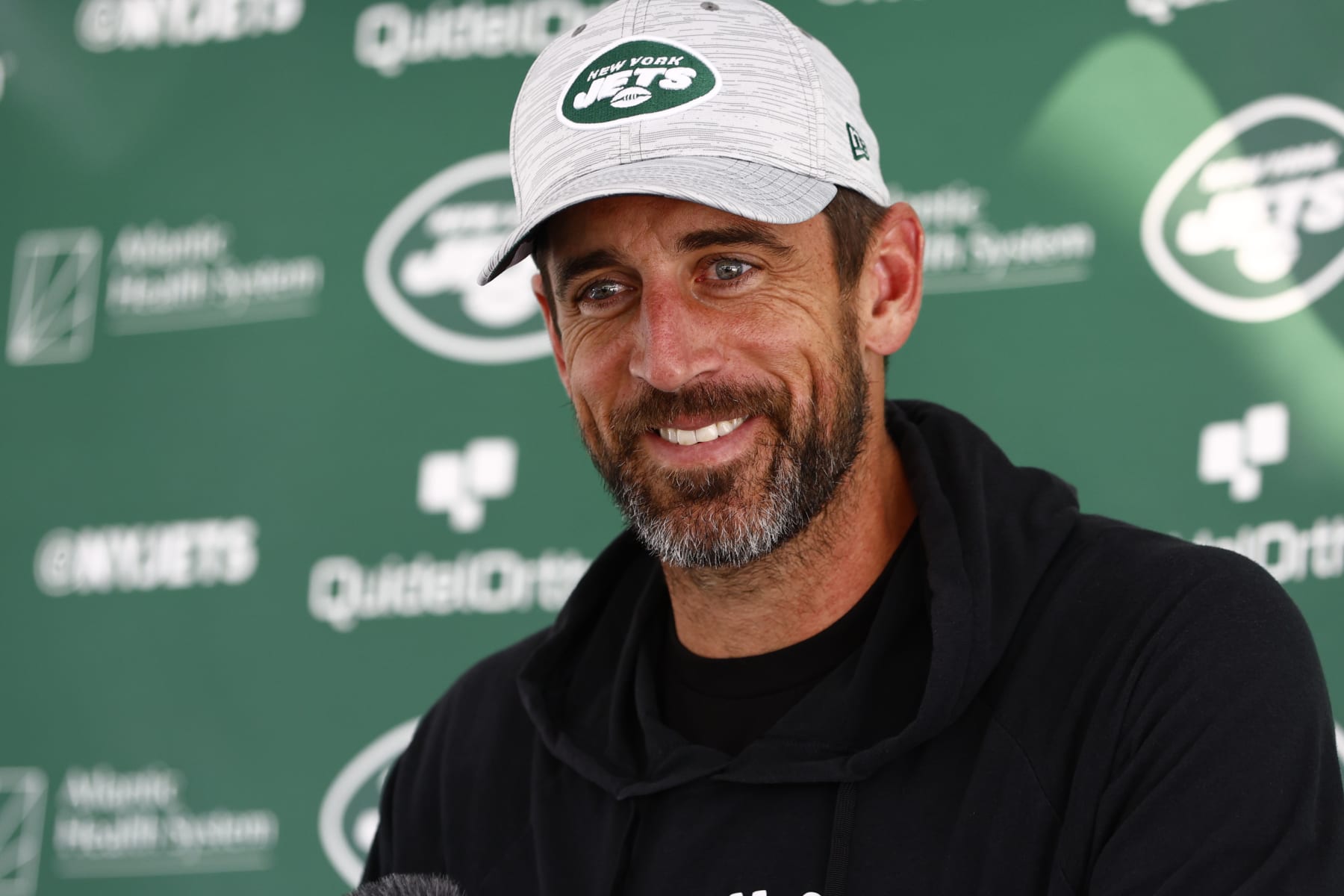 FLORHAM PARK, NEW JERSEY - JULY 26: Quarterback Aaron Rodgers #8 of the New York Jets talks to reporters after training camp at Atlantic Health Jets Training Center on July 26, 2023 in Florham Park, New Jersey. (Photo by Rich Schultz/Getty Images)