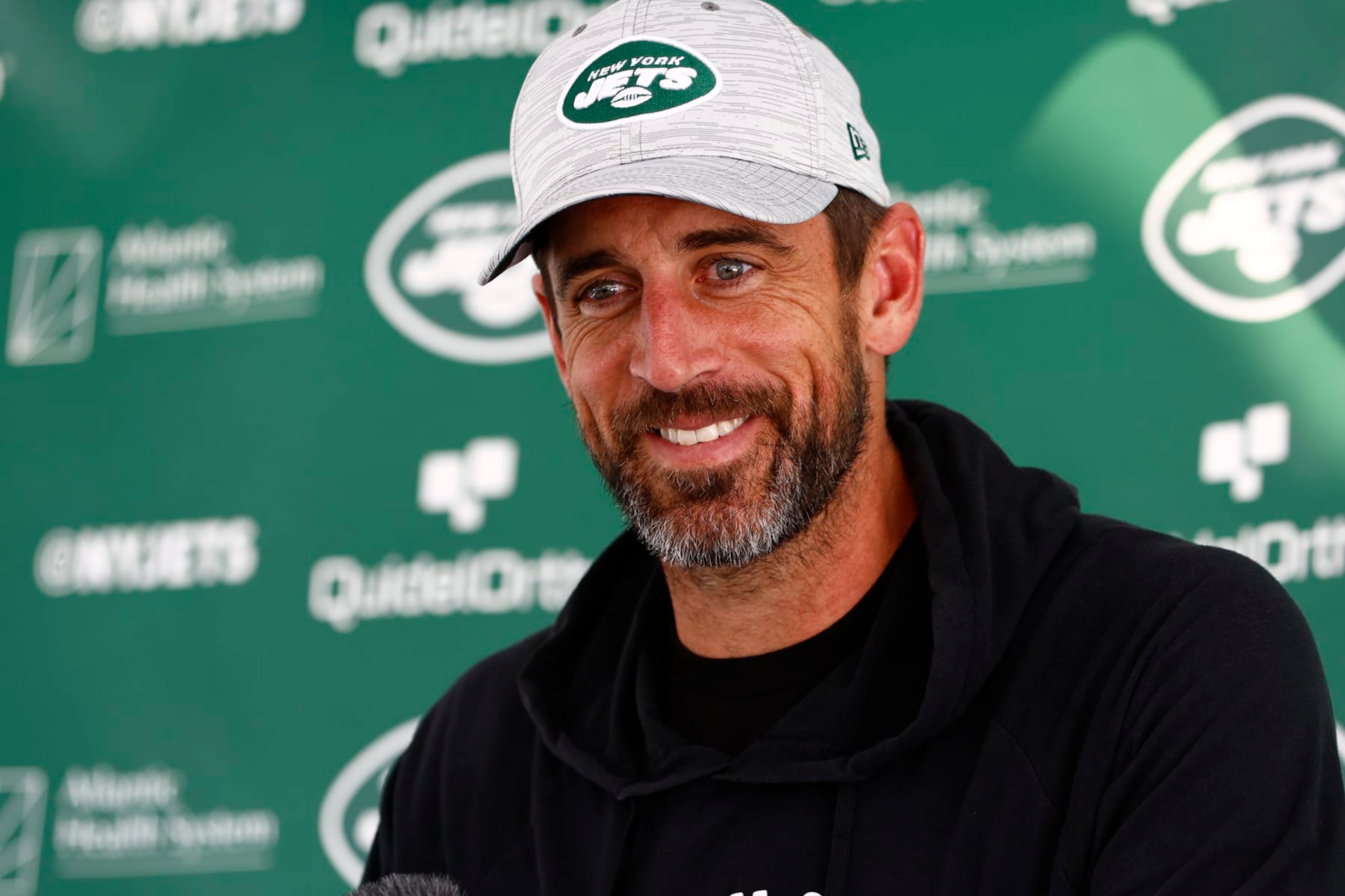 FLORHAM PARK, NEW JERSEY - JULY 26: Quarterback Aaron Rodgers #8 of the New York Jets talks to reporters after training camp at Atlantic Health Jets Training Center on July 26, 2023 in Florham Park, New Jersey. (Photo by Rich Schultz/Getty Images)