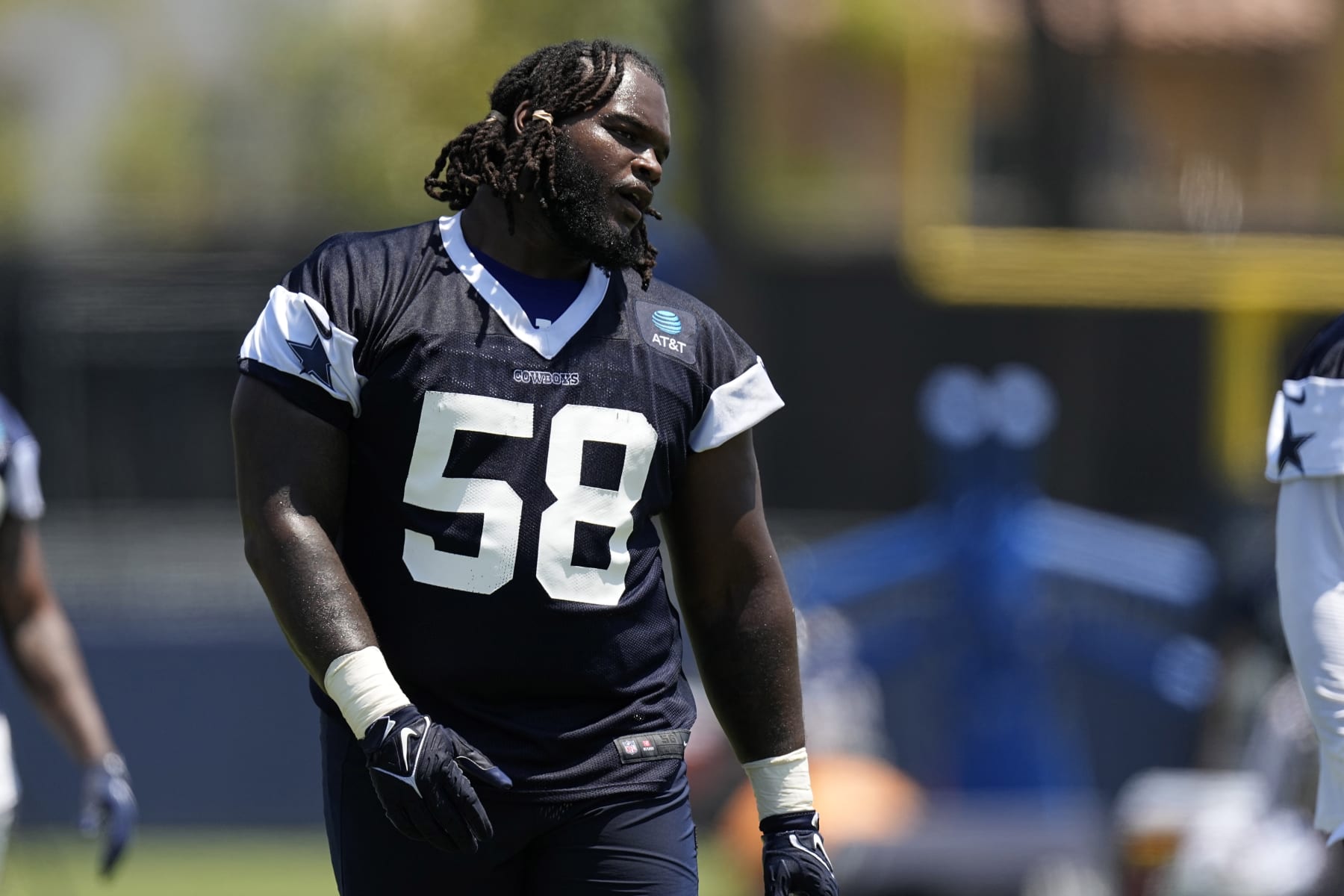 Dallas Cowboys defensive tackle Mazi Smith stands on the field during the NFL football team's training camp Saturday, July 29, 2023, in Oxnard, Calif. (AP Photo/Mark J. Terrill)