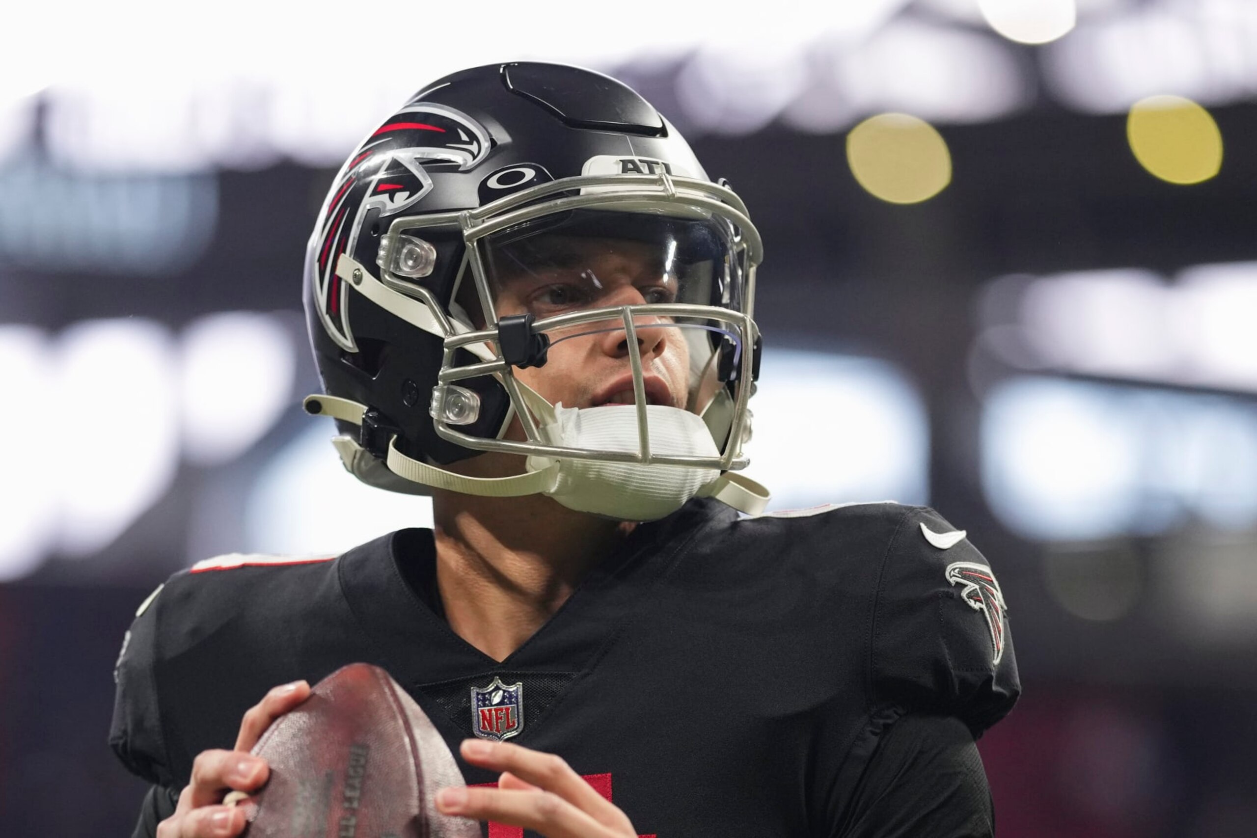 ATLANTA, GA - JANUARY 08: Desmond Ridder #4 of the Atlanta Falcons warms up against the Tampa Bay Buccaneers at Mercedes-Benz Stadium on January 8, 2023 in Atlanta, Georgia. (Photo by Cooper Neill/Getty Images)