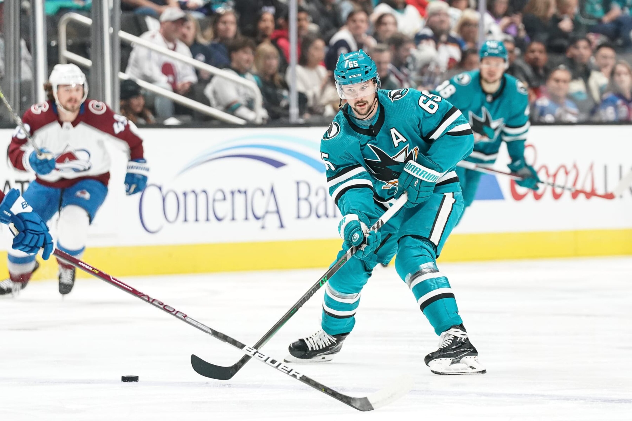 SAN JOSE, CA - APRIL 6: Erik Karlsson #65 of the San Jose Sharks skates ahead with the puck in the first period against the Colorado Avalanche at SAP Center on April 6, 2023 in San Jose, California. (Photo by Kavin Mistry/NHLI via Getty Images)
