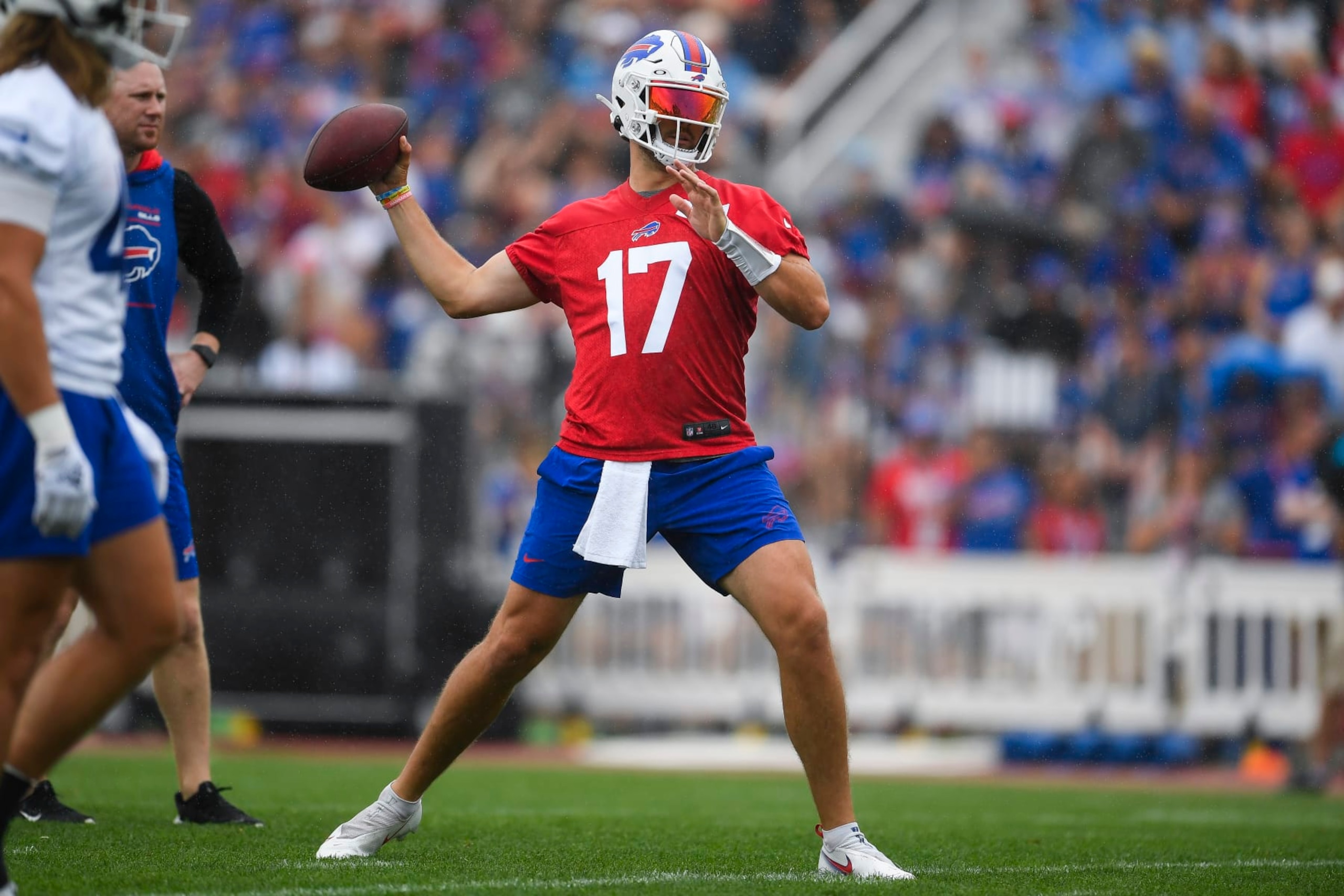 Buffalo Bills quarterback Josh Allen (17) throws a pass during practice at the NFL football team's training camp in Pittsford, N.Y., Thursday, July 27, 2023. (AP Photo/Adrian Kraus)