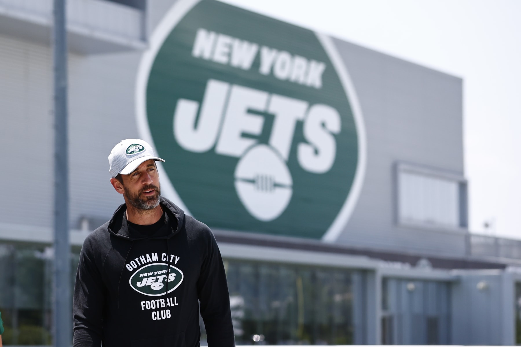 FLORHAM PARK, NEW JERSEY - JULY 26: Quarterback Aaron Rodgers #8 of the New York Jets walks to the media tent to talk to reporters after training camp at Atlantic Health Jets Training Center on July 26, 2023 in Florham Park, New Jersey. (Photo by Rich Schultz/Getty Images)