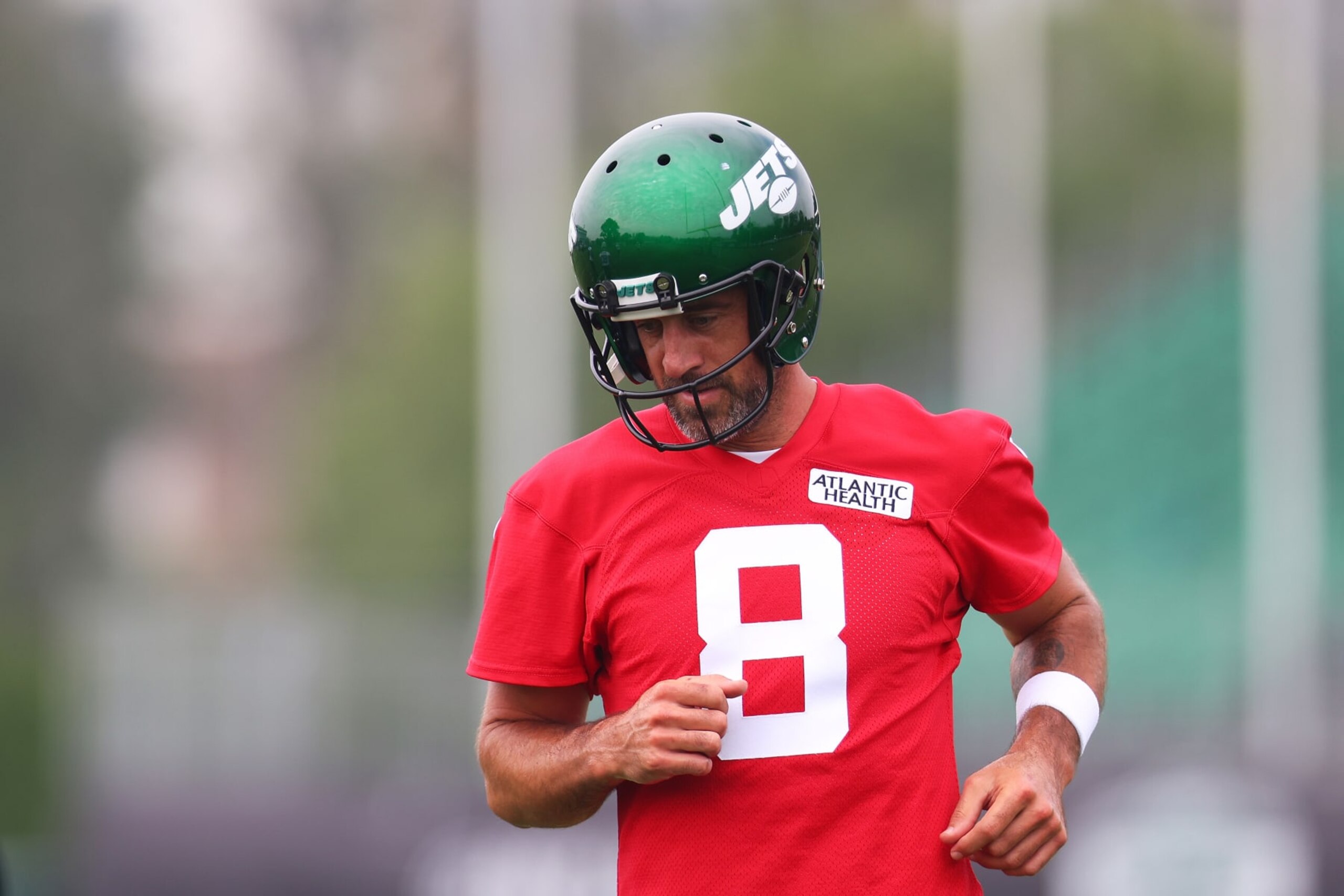 FLORHAM PARK, NEW JERSEY - JULY 20: Aaron Rodgers #8 of the New York Jets run drills during training camp at Atlantic Health Jets Training Center on July 20, 2023 in Florham Park, New Jersey. (Photo by Mike Stobe/Getty Images)