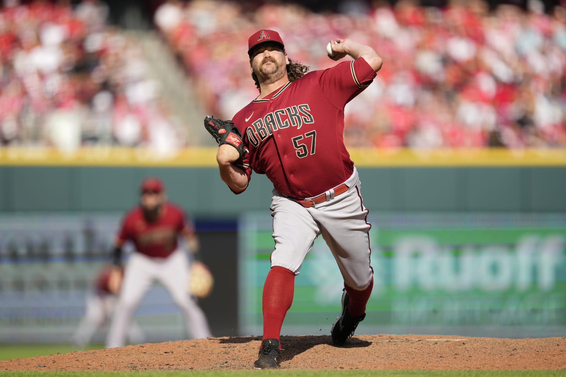 CINCINNATI, OHIO - JULY 22: Andrew Chafin #57 of the Arizona Diamondbacks throws during a baseball game against the Cincinnati Reds at Great American Ball Park on July 22, 2023 in Cincinnati, Ohio. (Photo by Jeff Dean/Getty Images)