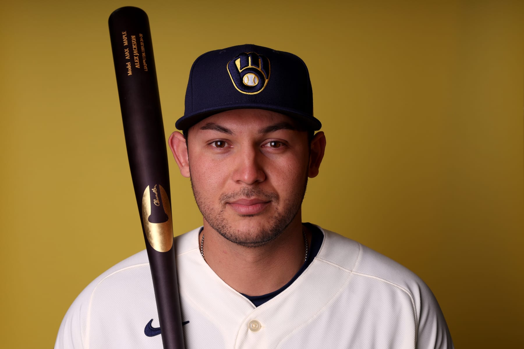 PHOENIX, ARIZONA - FEBRUARY 22: Alex Jackson #14 of the Milwaukee Brewers poses for a portrait during photo day at American Family Fields of Phoenix on February 22, 2023 in Phoenix, Arizona. (Photo by Steph Chambers/Getty Images)