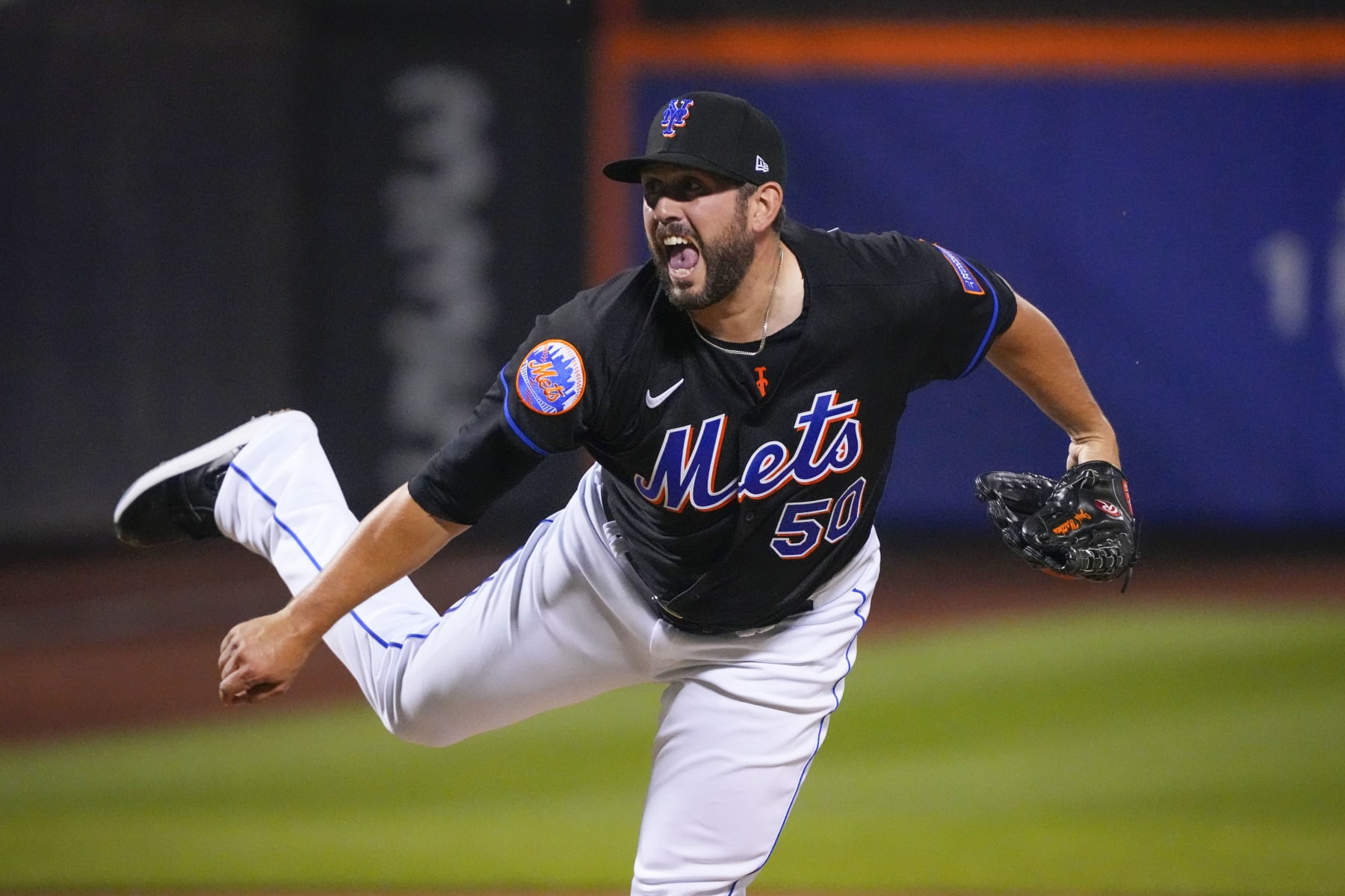 FLUSHING, NY - JULY 14: New York Mets Pitcher Dominic Leone (50) delivers a pitch during the eighth inning of the MLB game between the Los Angels Dodgers and New York Mets on July 14, 2023, at Citi Field in Flushing, NY. (Photo by Gregory Fisher/Icon Sportswire via Getty Images)