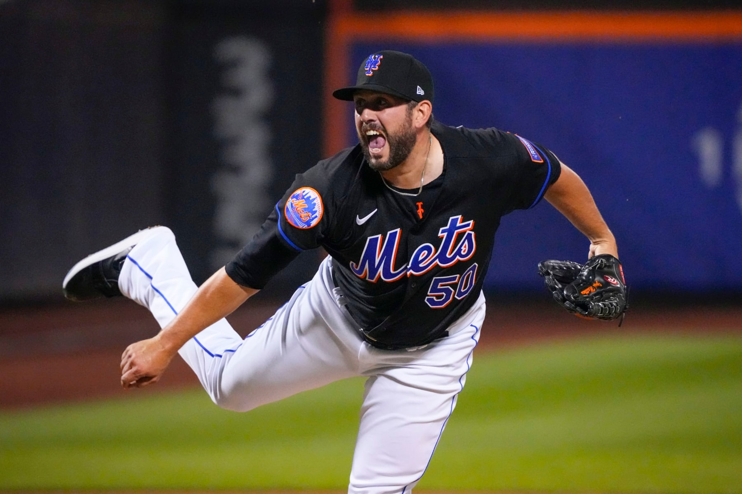 FLUSHING, NY - JULY 14: New York Mets Pitcher Dominic Leone (50) delivers a pitch during the eighth inning of the MLB game between the Los Angels Dodgers and New York Mets on July 14, 2023, at Citi Field in Flushing, NY. (Photo by Gregory Fisher/Icon Sportswire via Getty Images)