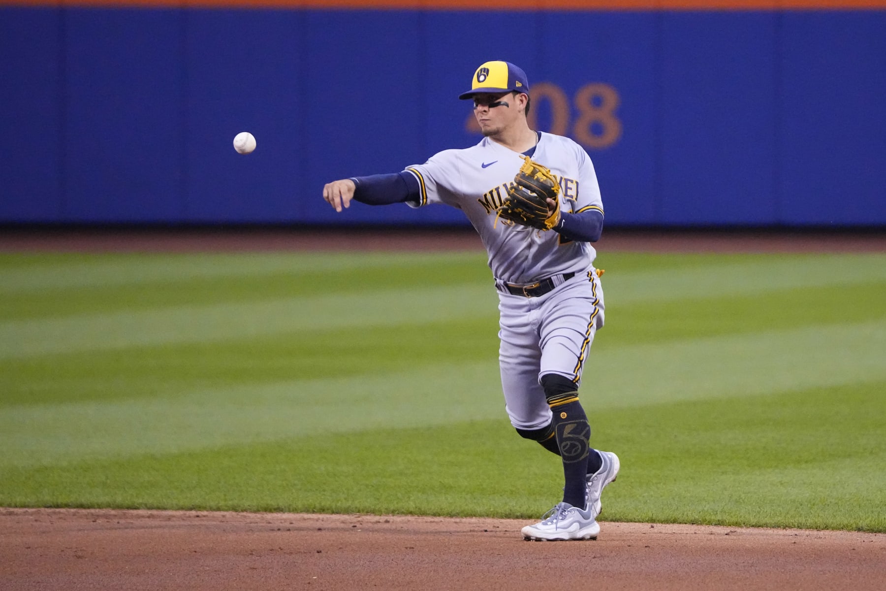 FLUSHING, NY - JUNE 27: Milwaukee Brewers Third Baseman Luis Urias (2) throws out New York Mets Third Basaman Brett Baty (not pictured) after fielding a ground ball during the third inning of a Major League Baseball game between the Milwaukee Brewers and New York Mets on June 27, 2023, at Citi Field in Flushing, NY. (Photo by Gregory Fisher/Icon Sportswire via Getty Images)