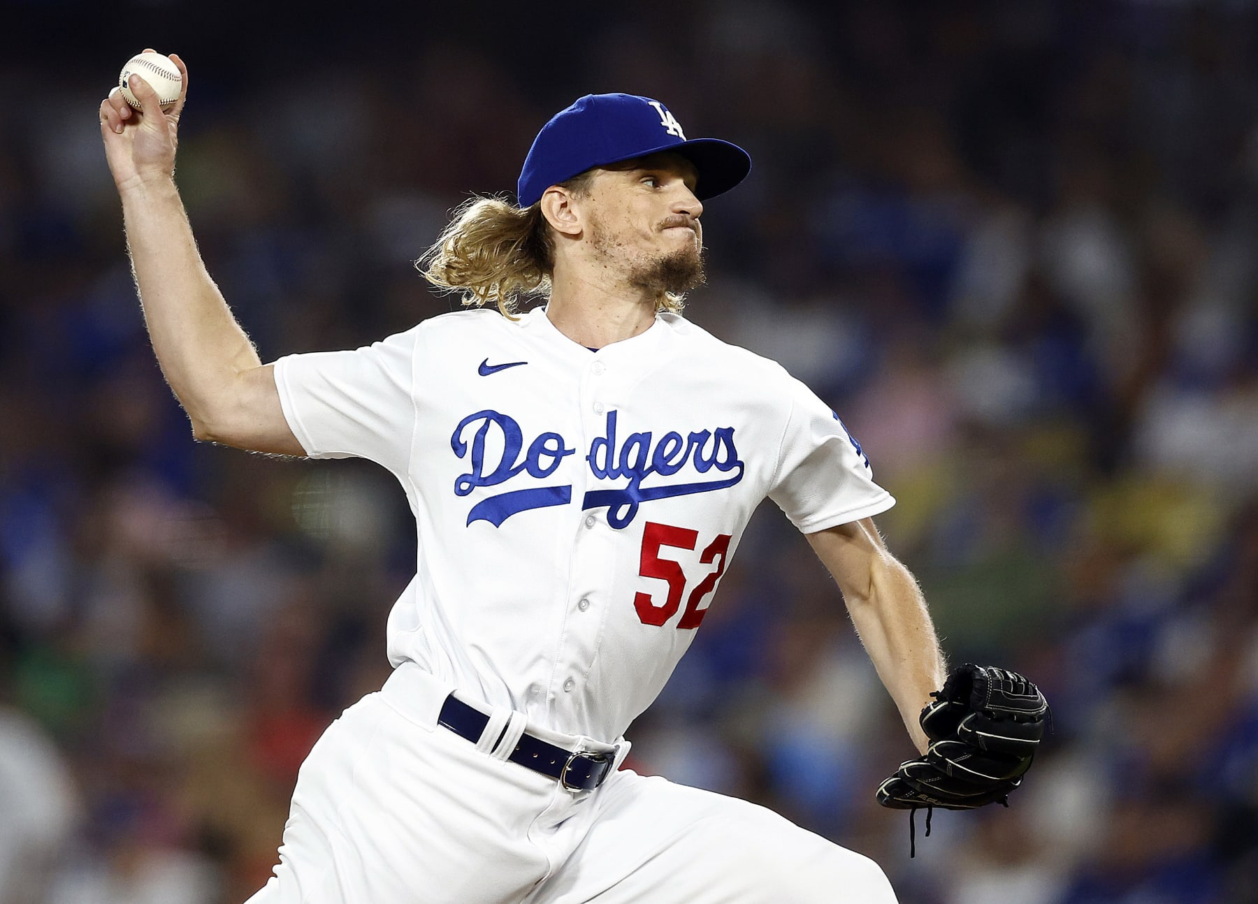LOS ANGELES, CALIFORNIA - JULY 28:  Phil Bickford #52 of the Los Angeles Dodgers throws against the Cincinnati Reds in the seventh inning at Dodger Stadium on July 28, 2023 in Los Angeles, California. (Photo by Ronald Martinez/Getty Images)