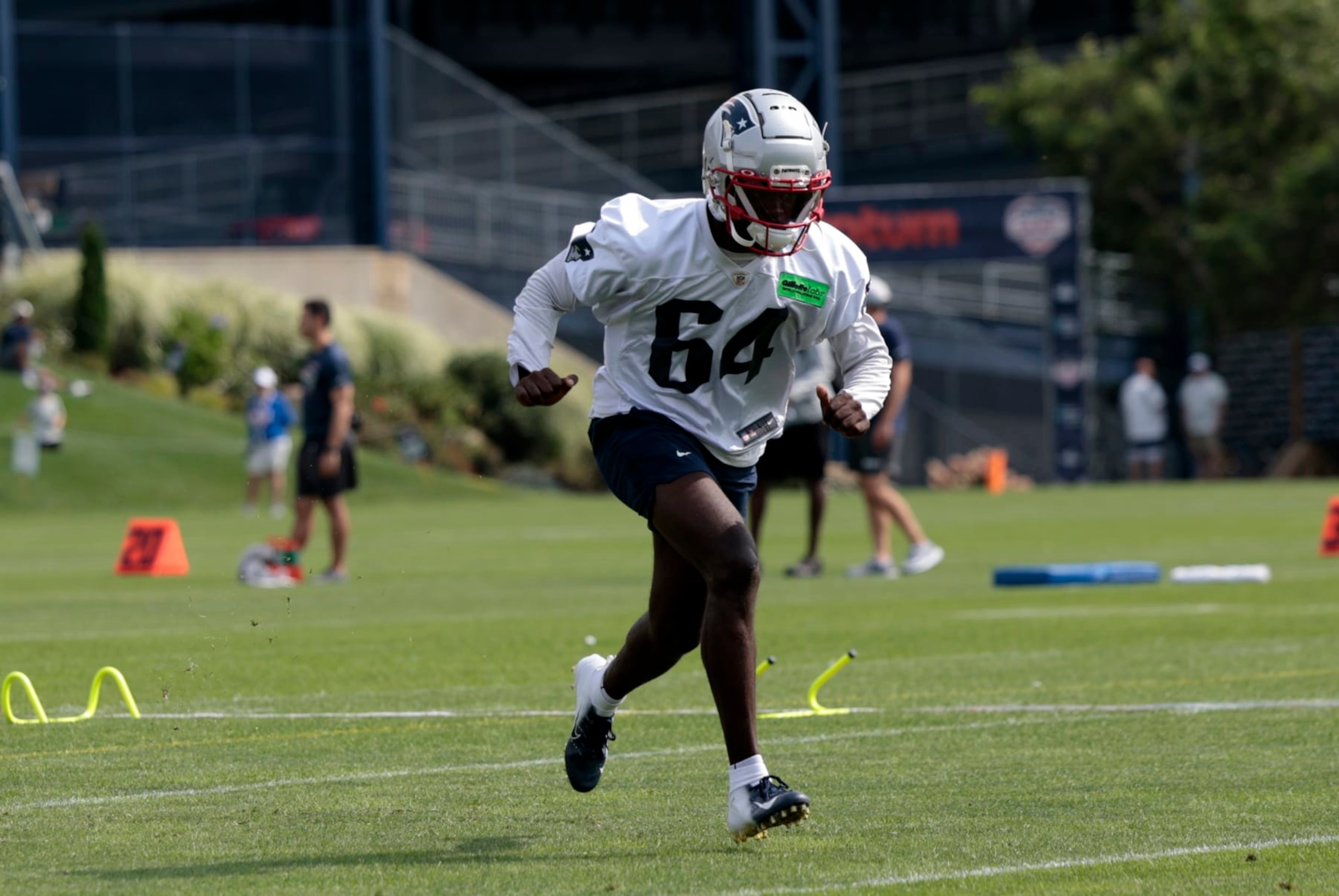 FOXBOROUGH, MA - JULY 27: New England Patriots quarterback Malik Cunningham (64) during New England Patriots Training Camp on July 27, 2023, at the Patriots Training Facility at Gillette Stadium in Foxborough, Massachusetts. (Photo by Fred Kfoury III/Icon Sportswire via Getty Images) FOXBOROUGH, MA - JULY 27: New England Patriots quarterback Malik Cunningham (64) during New England Patriots Training Camp on July 27, 2023, at the Patriots Training Facility at Gillette Stadium in Foxborough, Massachusetts. (Photo by Fred Kfoury III/Icon Sportswire via Getty Images)
