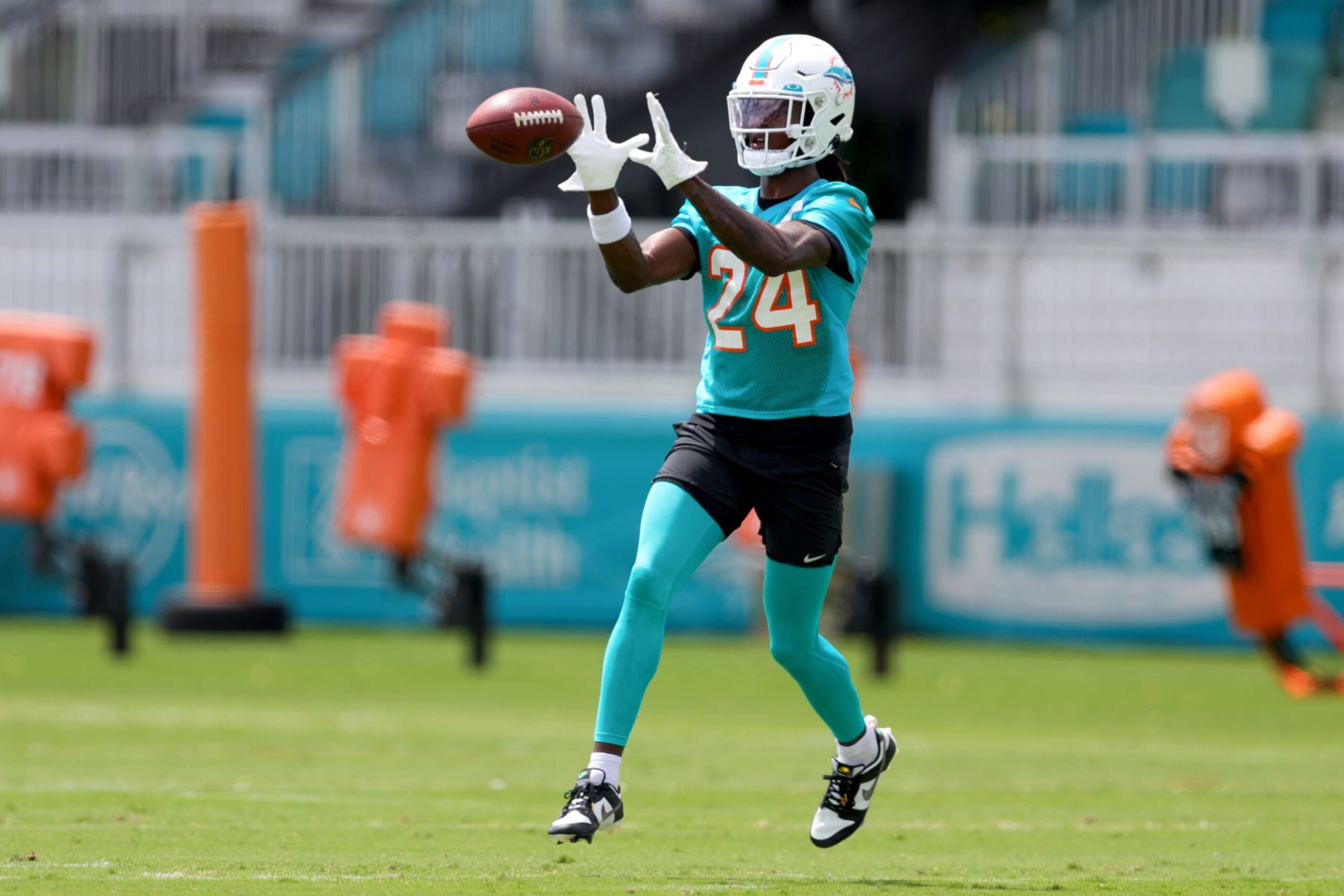 MIAMI GARDENS, FLORIDA - JUNE 08: Cam Smith #24 of the Miami Dolphins takes part in a drill during practice at Baptist Health Training Complex on June 08, 2023 in Miami Gardens, Florida. (Photo by Megan Briggs/Getty Images)
