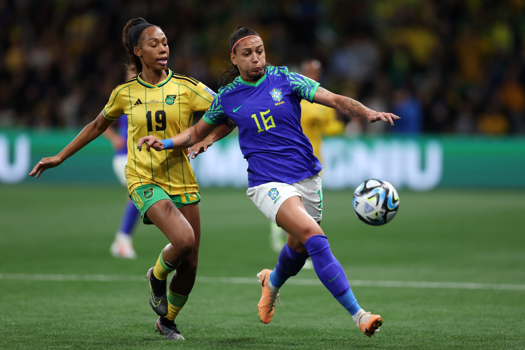 MELBOURNE, AUSTRALIA - AUGUST 02: Bia Zaneratto of Brazil is put under pressure by Tiernny Wiltshire of Jamaica during the FIFA Women's World Cup Australia & New Zealand 2023 Group F match between Jamaica and Brazil at Melbourne Rectangular Stadium on August 02, 2023 in Melbourne, Australia. (Photo by Alex Pantling - FIFA/FIFA via Getty Images)