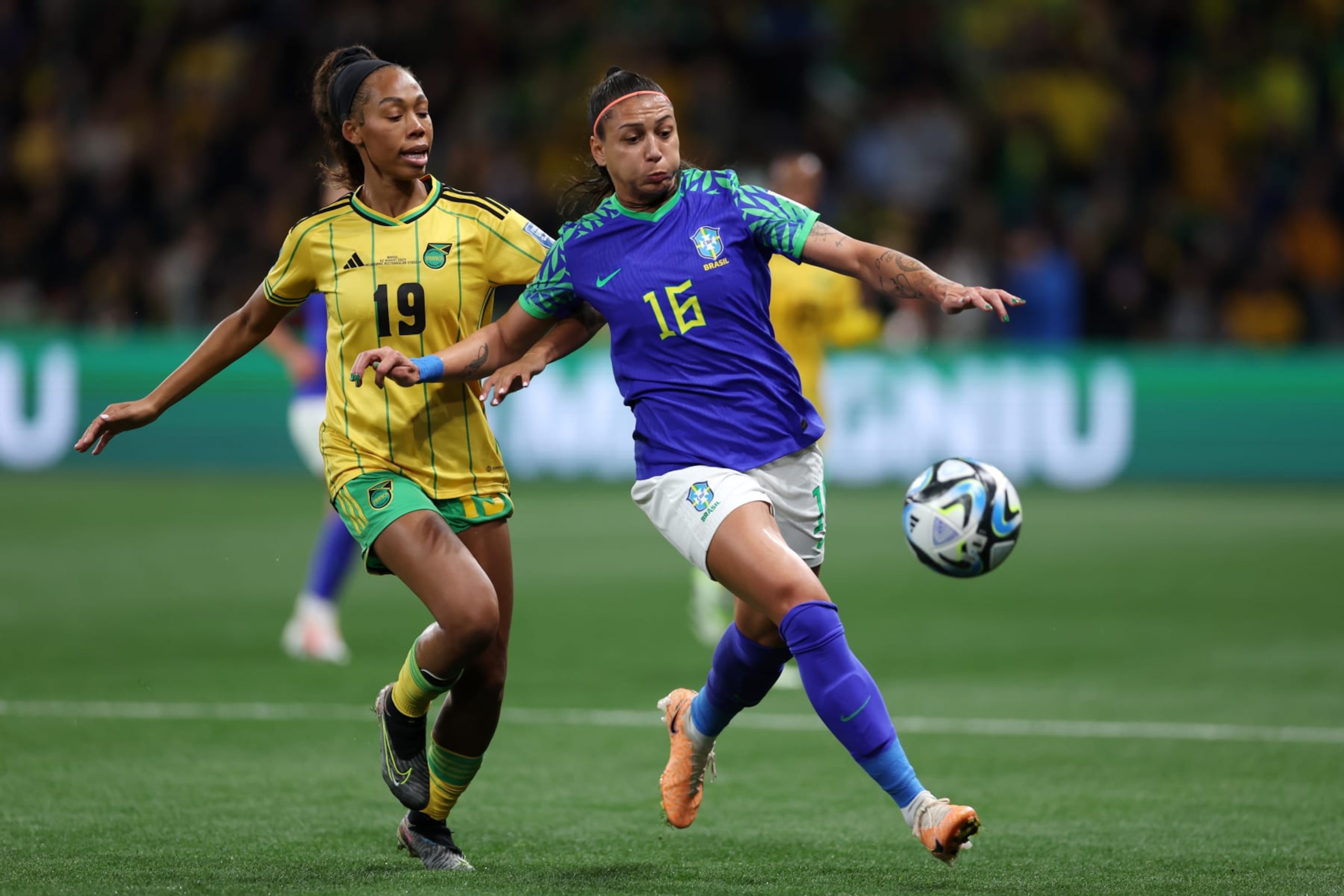 MELBOURNE, AUSTRALIA - AUGUST 02: Bia Zaneratto of Brazil is put under pressure by Tiernny Wiltshire of Jamaica during the FIFA Women's World Cup Australia & New Zealand 2023 Group F match between Jamaica and Brazil at Melbourne Rectangular Stadium on August 02, 2023 in Melbourne, Australia. (Photo by Alex Pantling - FIFA/FIFA via Getty Images)