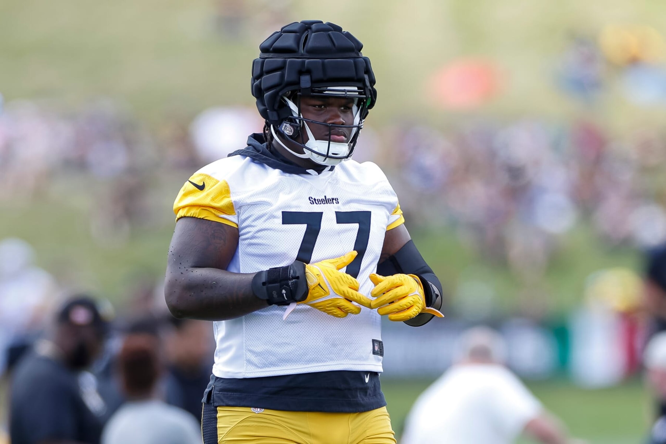 LATROBE, PA - JULY 29: Pittsburgh Steelers Broderick Jones (77) participates in a drill during the team's training camp at Saint Vincent College on July 29, 2023, in Latrobe, PA. (Photo by Brandon Sloter/Icon Sportswire via Getty Images)