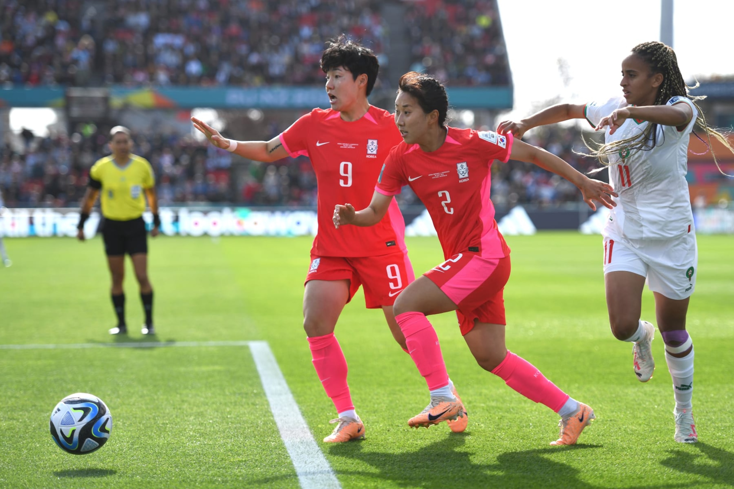ADELAIDE, AUSTRALIA - JULY 30: (L-R) Geummin Lee and Hyojoo Choo of Korea Republic, and Fatima Tagnaout of Morocco in action during the FIFA Women's World Cup Australia & New Zealand 2023 Group H match between South Korea and Morocco at Hindmarsh Stadium on July 30, 2023 in Adelaide, Australia. (Photo by Sue McKay/Getty Images)