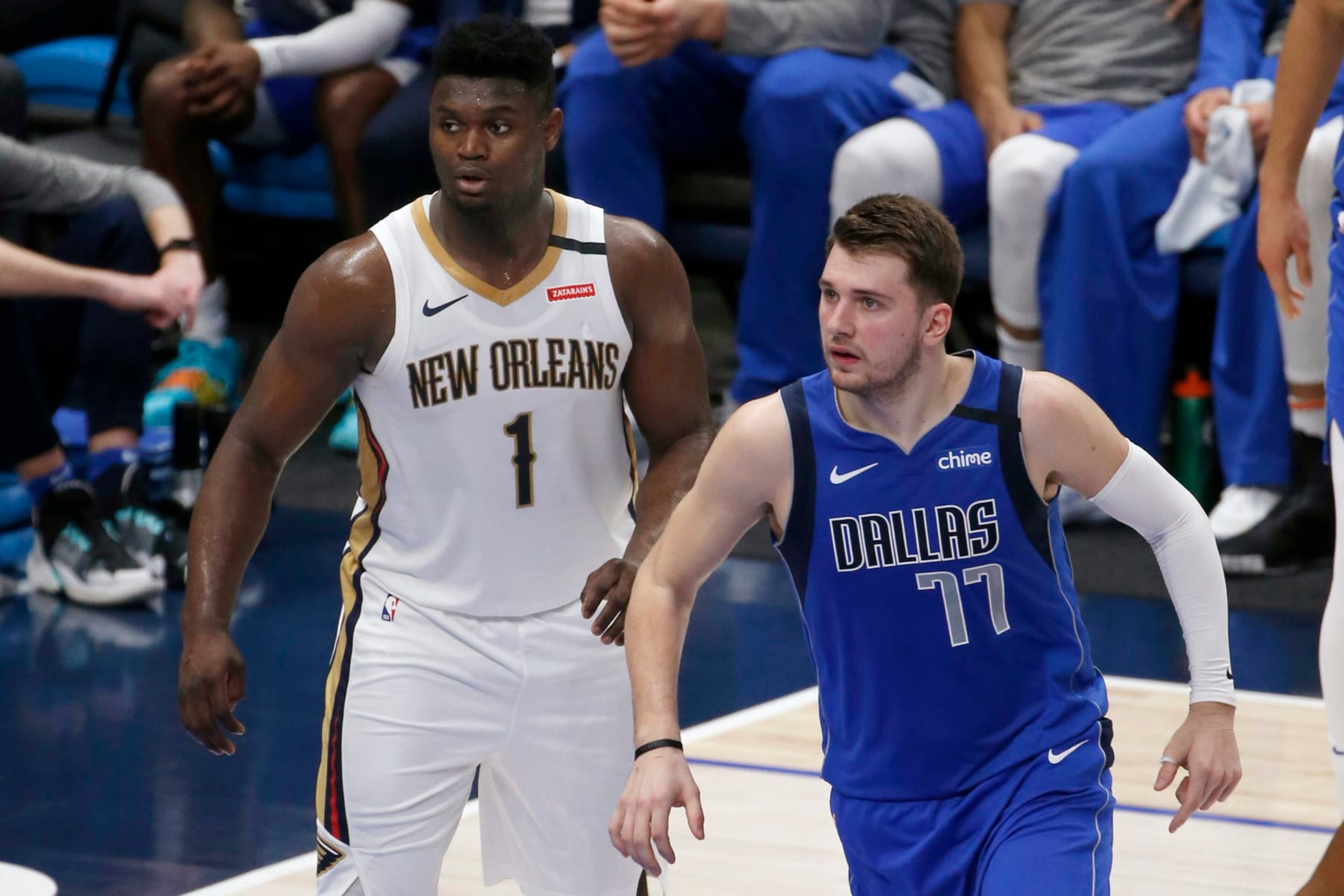 Zion Williamson, de los Pelicans de Nueva Orleáns, y Luka Doncic, de los Mavericks de Dallas, disputan el encuentro del miércoles 4 de marzo de 2020 (AP Foto/Michael Ainsworth) Zion Williamson, de los Pelicans de Nueva Orleáns, y Luka Doncic, de los Mavericks de Dallas, disputan el encuentro del miércoles 4 de marzo de 2020 (AP Foto/Michael Ainsworth)