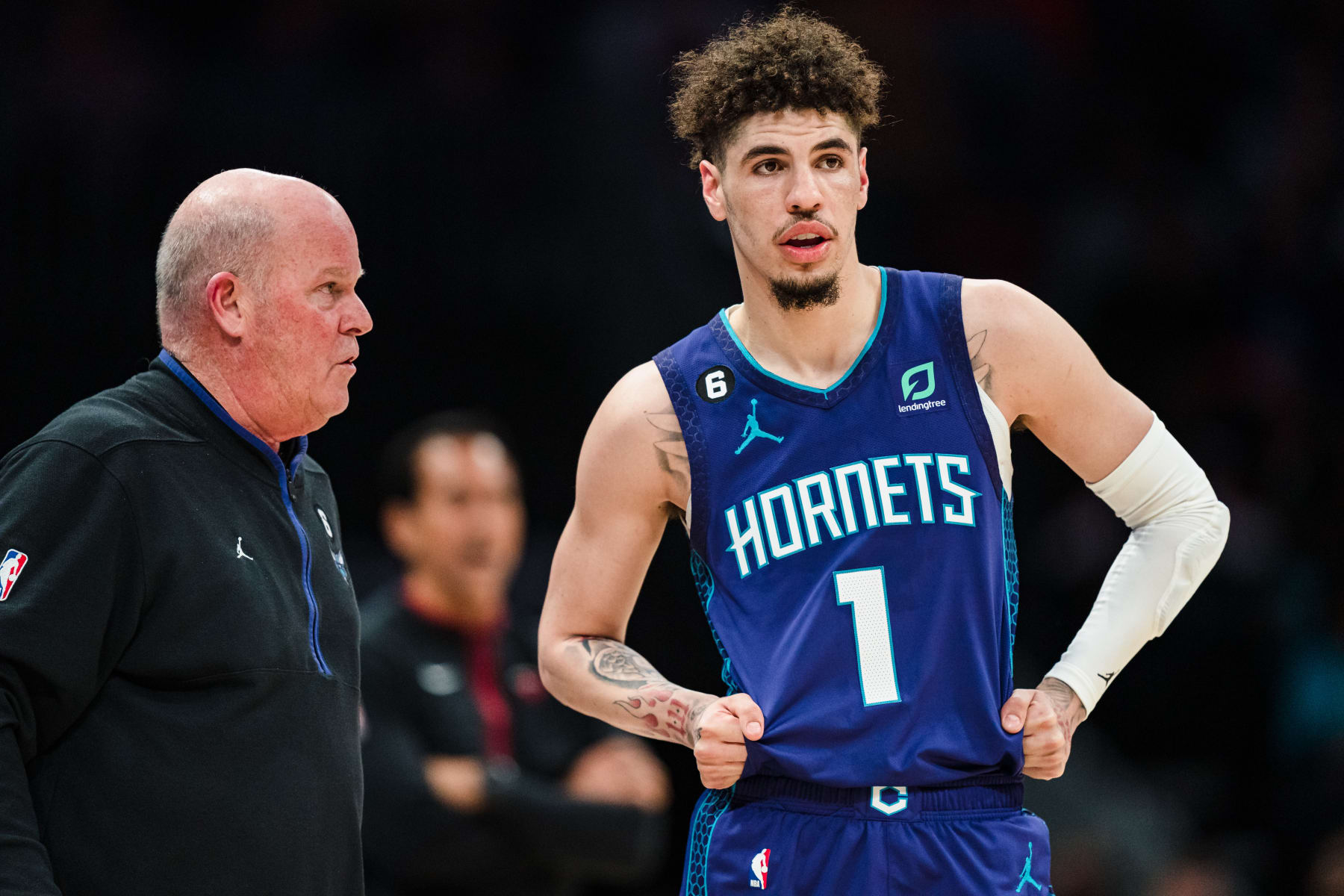CHARLOTTE, NORTH CAROLINA - FEBRUARY 25: Head coach Steve Clifford of the Charlotte Hornets talks with LaMelo Ball #1 during their game against the Miami Heat at Spectrum Center on February 25, 2023 in Charlotte, North Carolina. NOTE TO USER: User expressly acknowledges and agrees that, by downloading and or using this photograph, User is consenting to the terms and conditions of the Getty Images License Agreement. (Photo by Jacob Kupferman/Getty Images)