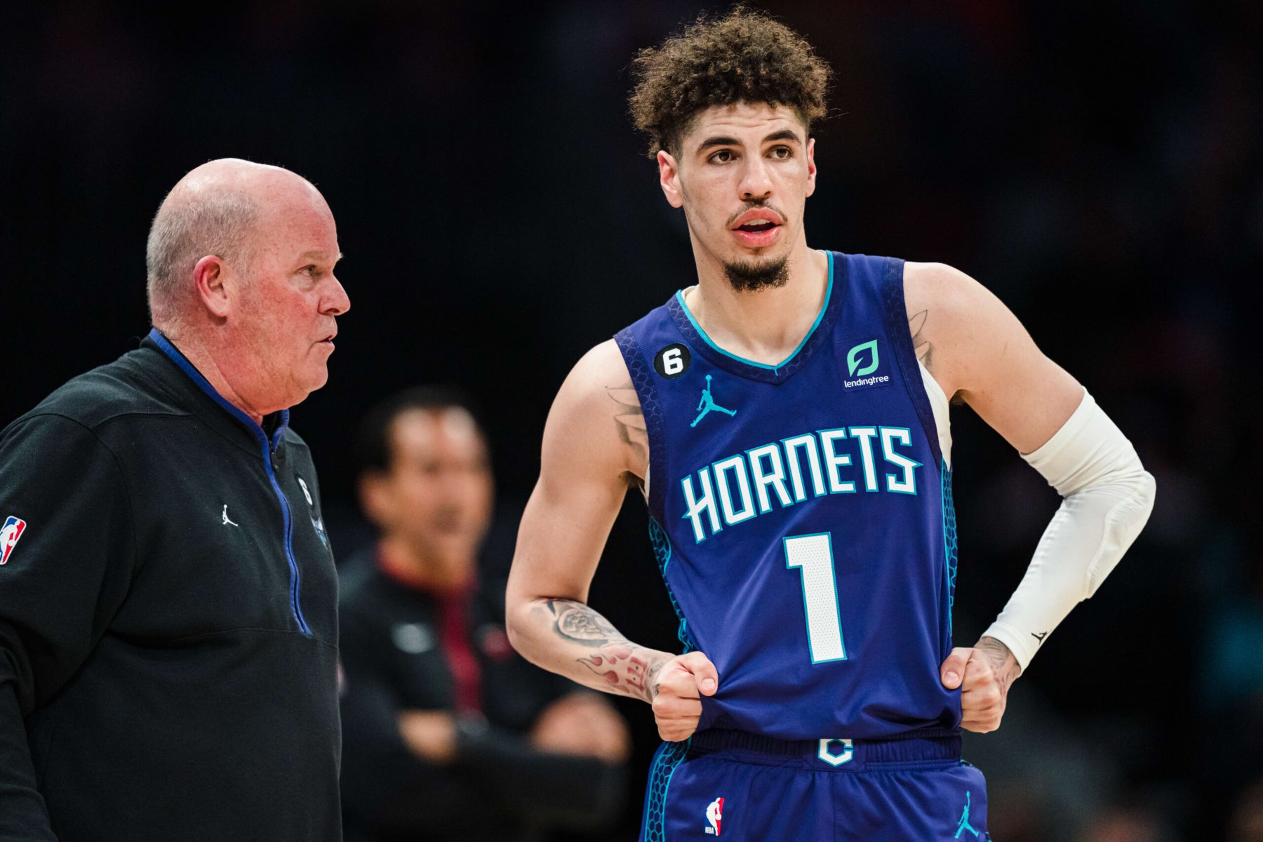 CHARLOTTE, NORTH CAROLINA - FEBRUARY 25: Head coach Steve Clifford of the Charlotte Hornets talks with LaMelo Ball #1 during their game against the Miami Heat at Spectrum Center on February 25, 2023 in Charlotte, North Carolina. NOTE TO USER: User expressly acknowledges and agrees that, by downloading and or using this photograph, User is consenting to the terms and conditions of the Getty Images License Agreement. (Photo by Jacob Kupferman/Getty Images)