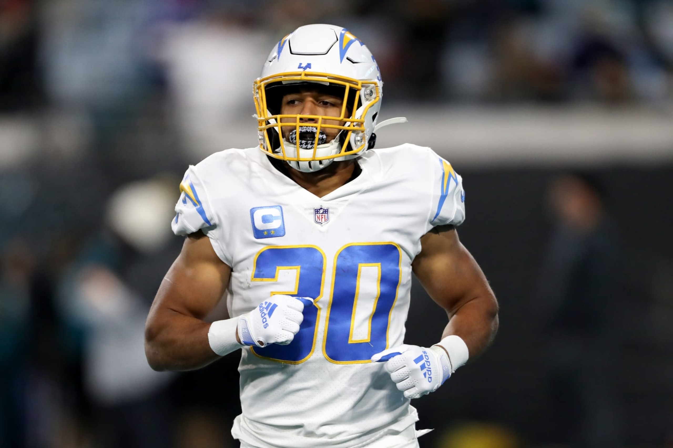 JACKSONVILLE, FLORIDA - JANUARY 14: Austin Ekeler #30 of the Los Angeles Chargers warms up prior to a game against the Jacksonville Jaguars in the AFC Wild Card playoff game at TIAA Bank Field on January 14, 2023 in Jacksonville, Florida. (Photo by Courtney Culbreath/Getty Images) JACKSONVILLE, FLORIDA - JANUARY 14: Austin Ekeler #30 of the Los Angeles Chargers warms up prior to a game against the Jacksonville Jaguars in the AFC Wild Card playoff game at TIAA Bank Field on January 14, 2023 in Jacksonville, Florida. (Photo by Courtney Culbreath/Getty Images)