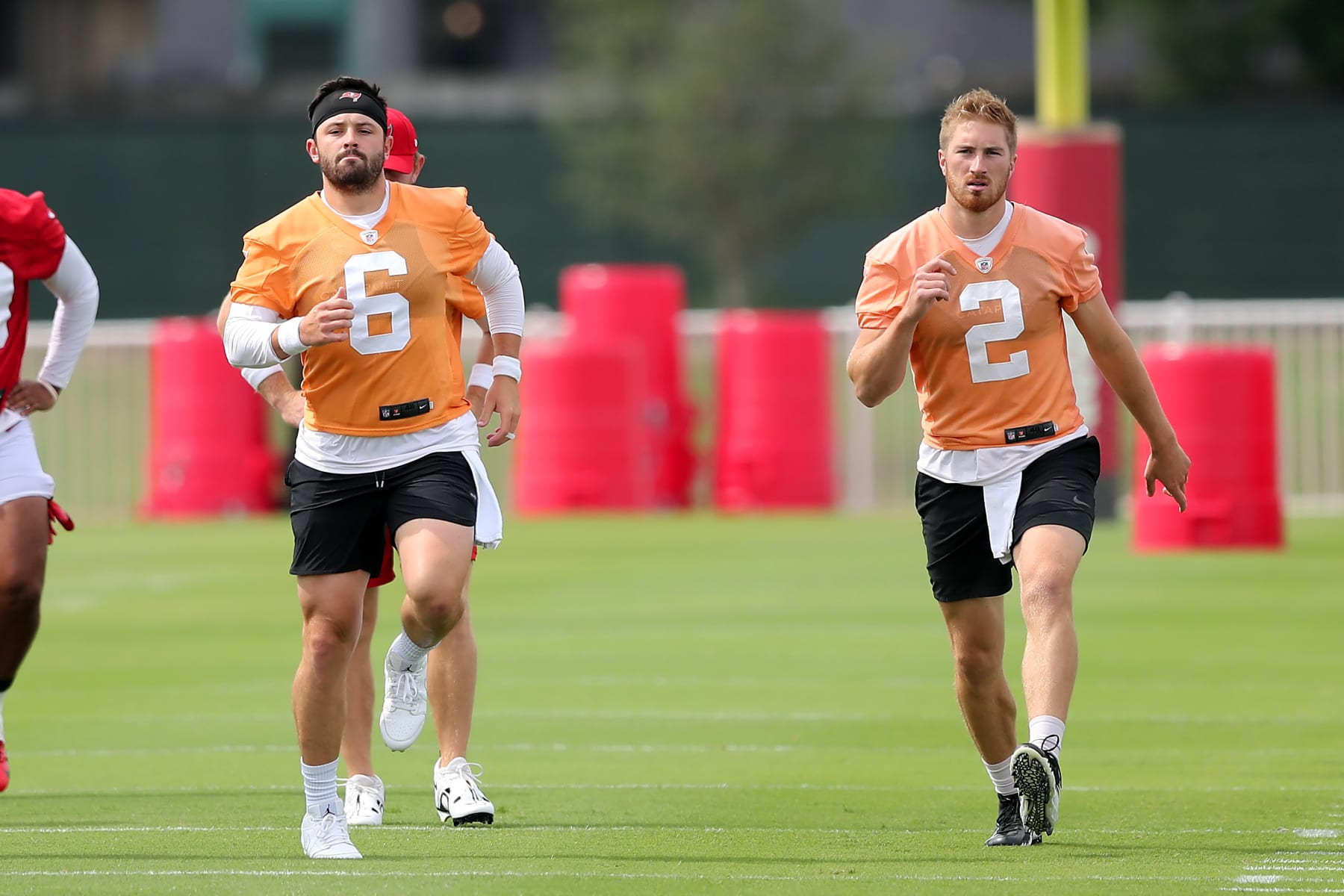 Baker Mayfield (left) and Kyle Trask (right)