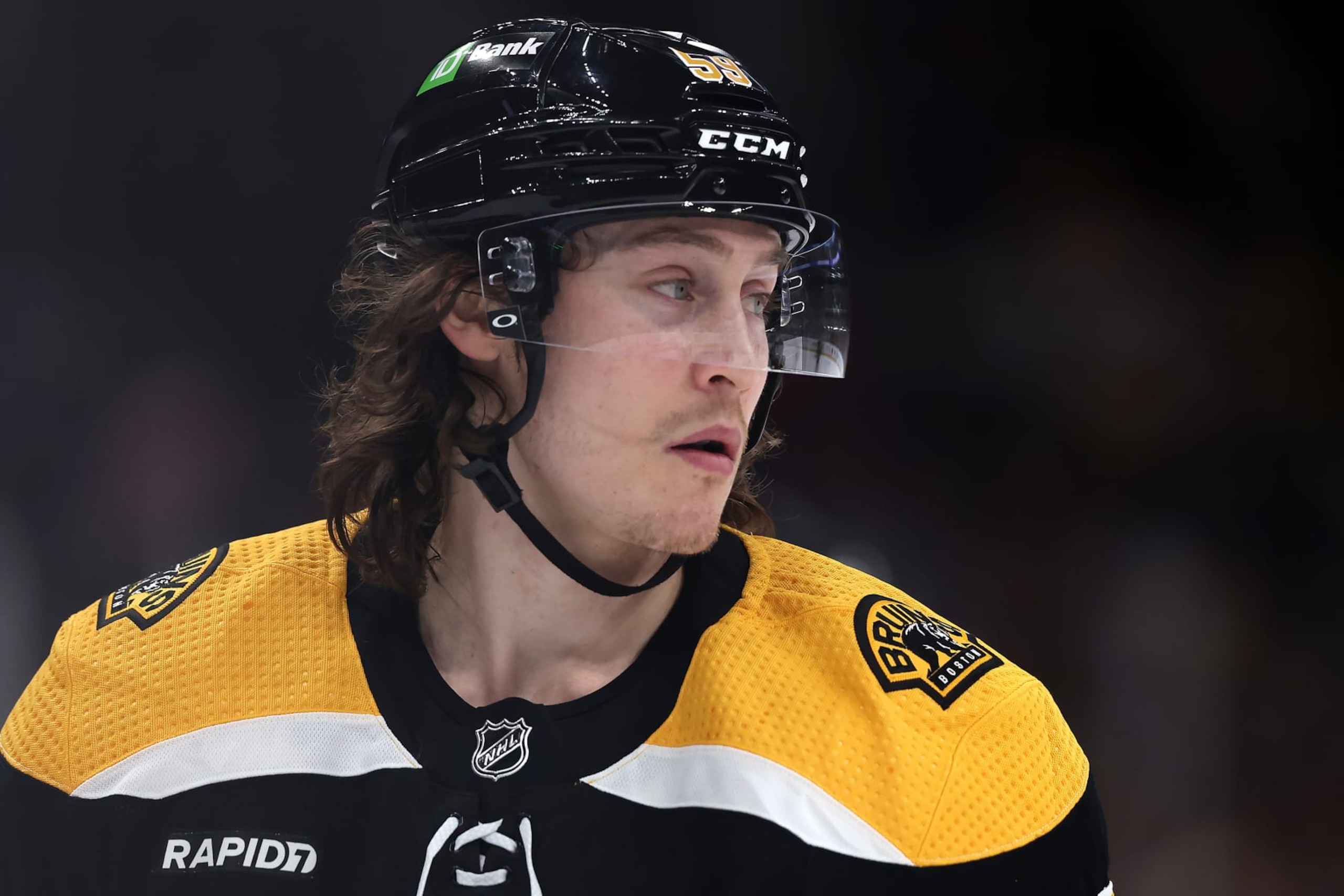 BOSTON, MASSACHUSETTS - APRIL 11: Tyler Bertuzzi #59 of the Boston Bruins looks on during the first period against the Washington Capitals  at TD Garden on April 11, 2023 in Boston, Massachusetts. (Photo by Maddie Meyer/Getty Images)