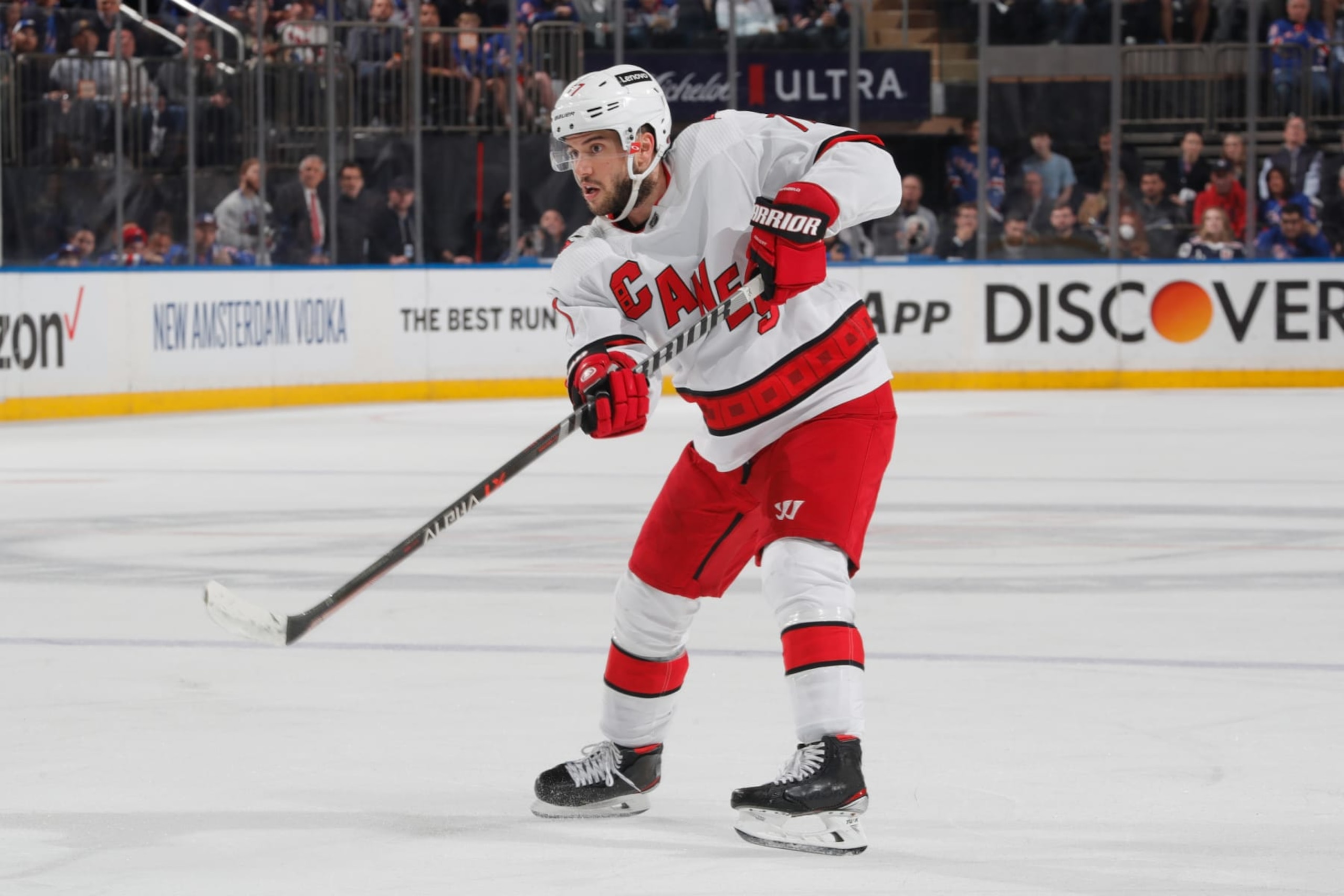 NEW YORK, NY - MAY 24:  Tony DeAngelo #77 of the Carolina Hurricanes skates with the puck against the New York Rangers in Game Four of the Second Round of the 2022 Stanley Cup Playoffs at Madison Square Garden on May 24, 2022 in New York City. (Photo by Jared Silber/NHLI via Getty Images)