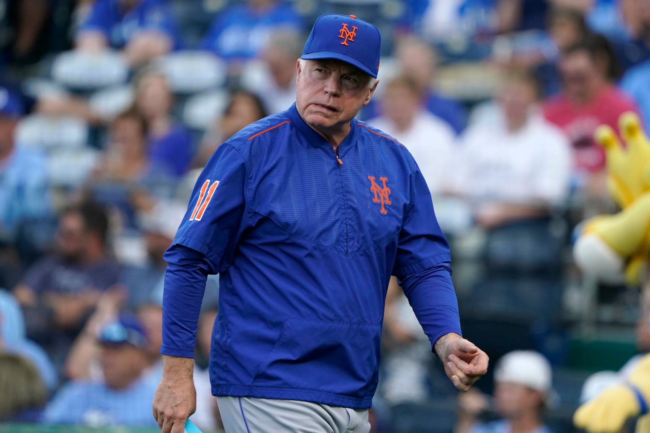 KANSAS CITY, MISSOURI - AUGUST 01: Manager Buck Showalter #11 of the New York Mets walks to the dugout after delivering the starting lineup prior to a game against the Kansas City Royals at Kauffman Stadium on August 01, 2023 in Kansas City, Missouri. (Photo by Ed Zurga/Getty Images)