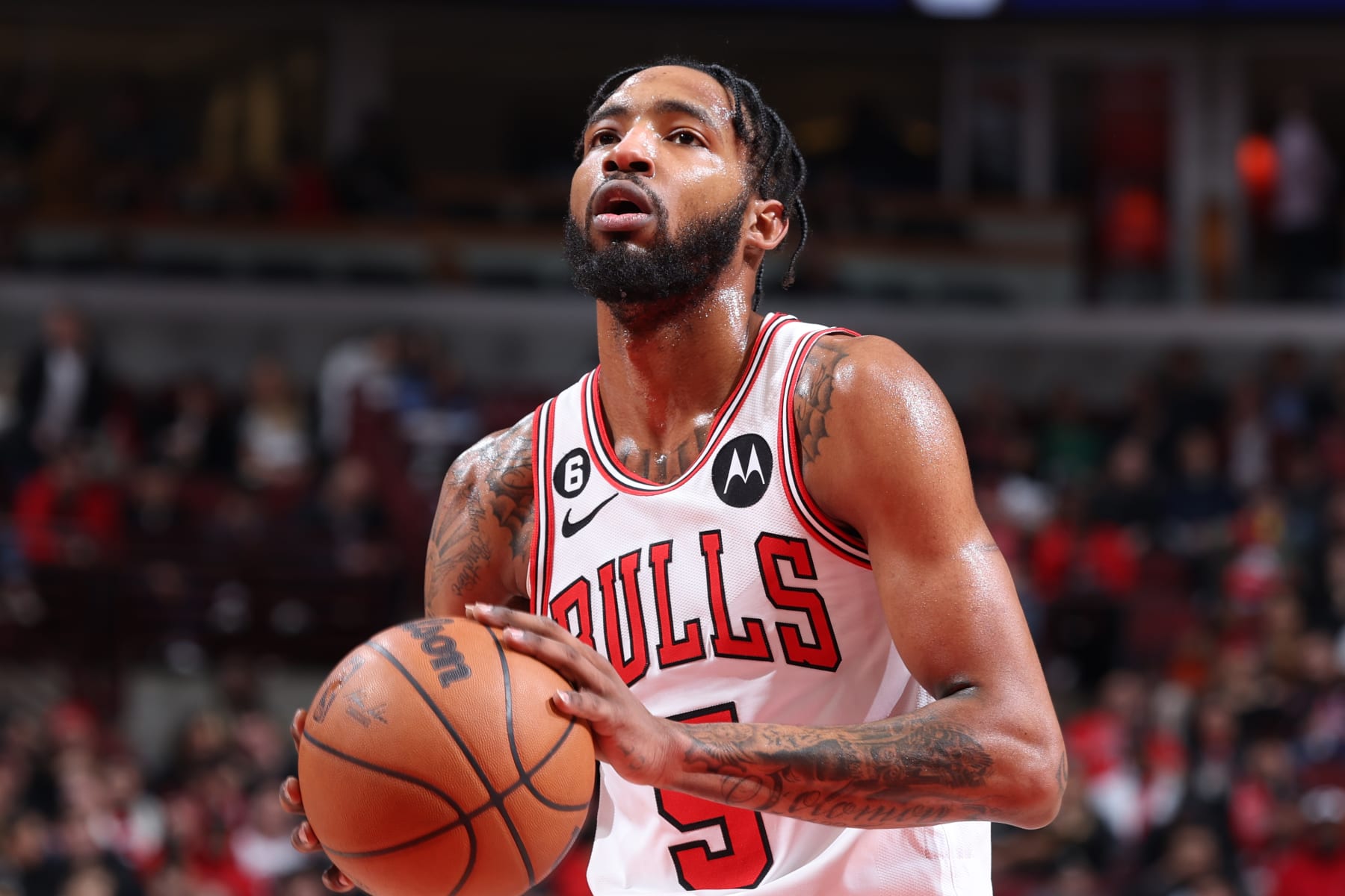 CHICAGO, IL - MARCH 21:  Derrick Jones Jr. #5 of the Chicago Bulls shoots a free throw during the game on March 21, 2023 at United Center in Chicago, Illinois. NOTE TO USER: User expressly acknowledges and agrees that, by downloading and or using this photograph, User is consenting to the terms and conditions of the Getty Images License Agreement. Mandatory Copyright Notice: Copyright 2023 NBAE (Photo by Jeff Haynes/NBAE via Getty Images)