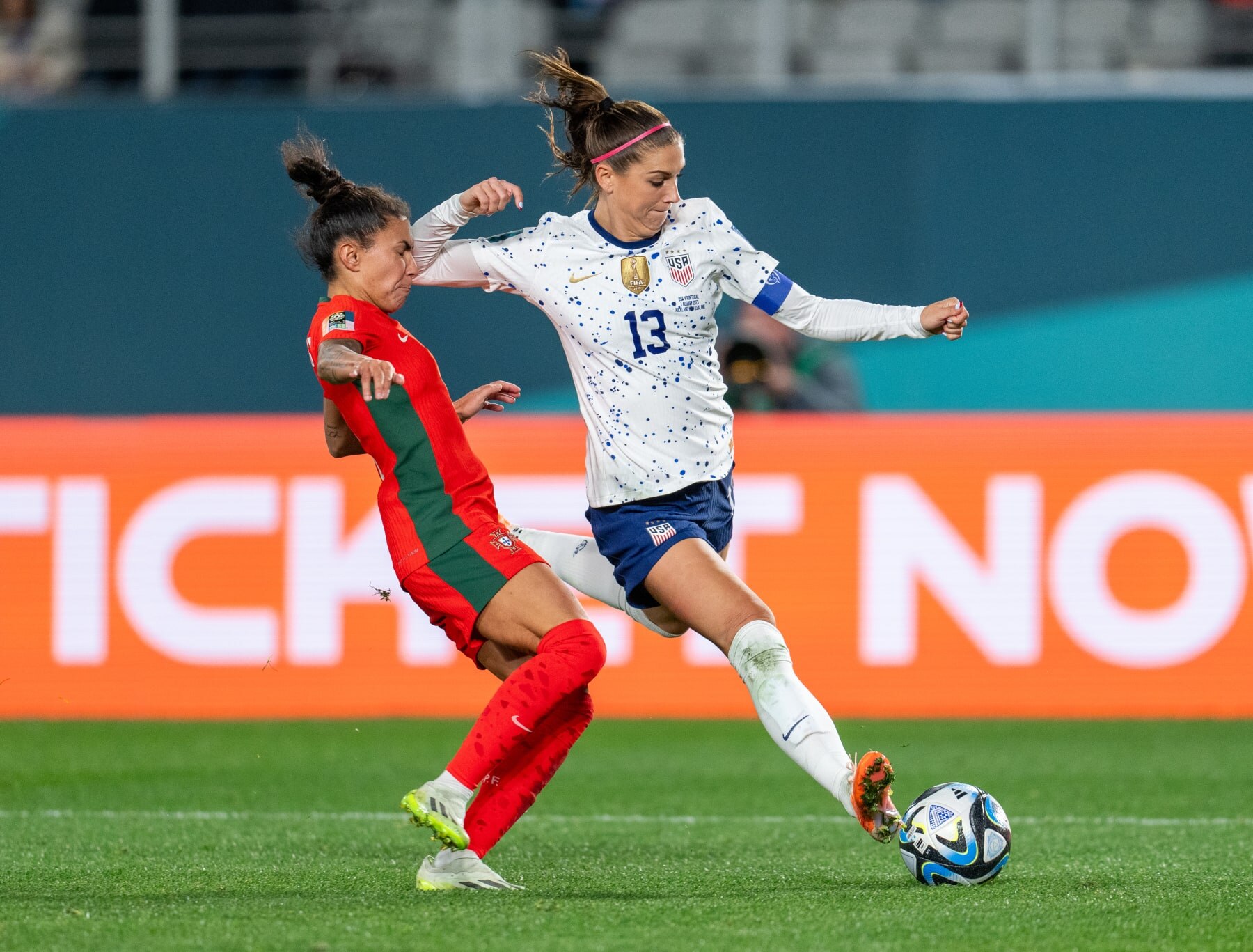 AUCKLAND, NEW ZEALAND - AUGUST 1: Alex Morgan #13 of the United States takes a shot during a FIFA World Cup Group Stage game between Portugal and USA at Eden Park on August 1, 2023 in Auckland, New Zealand. (Photo by Brad Smith/USSF/Getty Images for USSF).