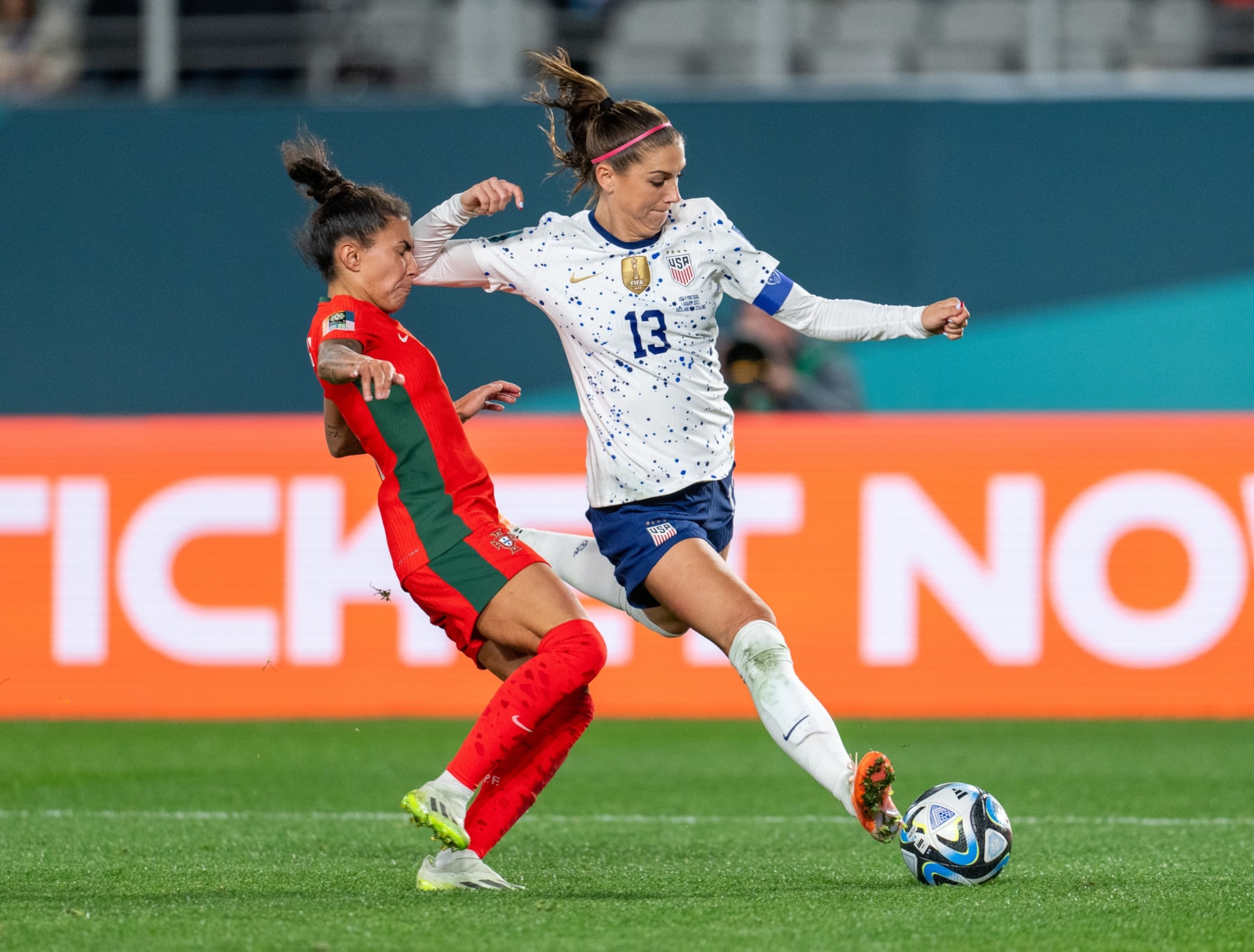 AUCKLAND, NEW ZEALAND - AUGUST 1: Alex Morgan #13 of the United States takes a shot during a FIFA World Cup Group Stage game between Portugal and USA at Eden Park on August 1, 2023 in Auckland, New Zealand. (Photo by Brad Smith/USSF/Getty Images for USSF).