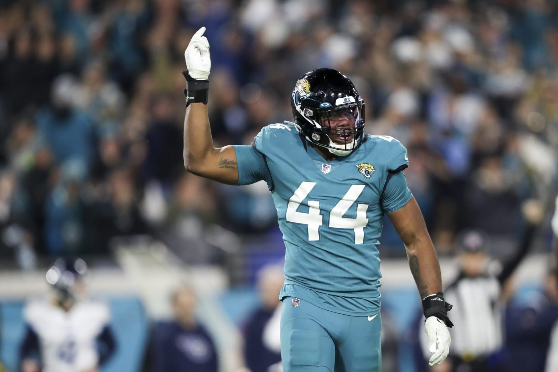 JACKSONVILLE, FLORIDA - JANUARY 07: Travon Walker #44 of the Jacksonville Jaguars reacts after a play during the fourth quarter against the Tennessee Titans at TIAA Bank Field on January 07, 2023 in Jacksonville, Florida. (Photo by Courtney Culbreath/Getty Images)