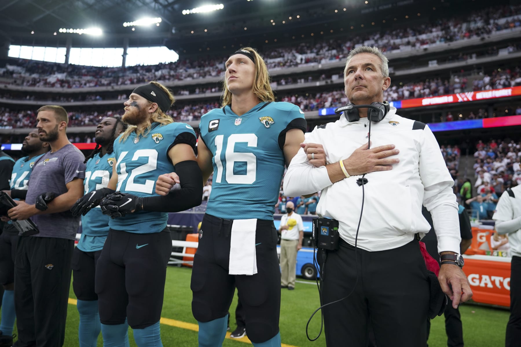 HOUSTON, TEXAS - SEPTEMBER 12: Jacksonville Jaguars head coach Urban Meyer looks on during the national anthem against the Houston Texans prior to an NFL game at NRG Stadium on September 12, 2021 in Houston, Texas. (Photo by Cooper Neill/Getty Images)