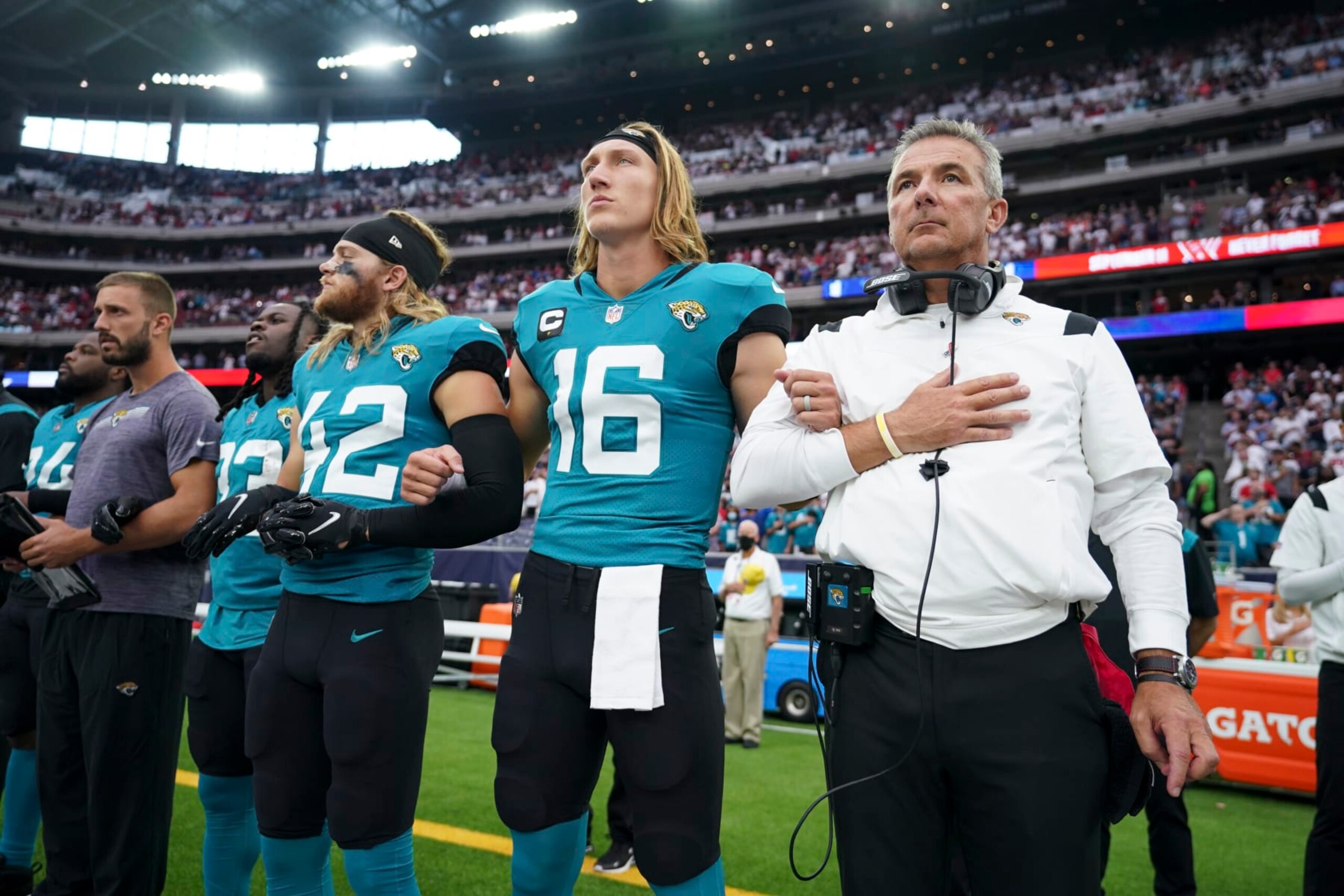 HOUSTON, TEXAS - SEPTEMBER 12: Jacksonville Jaguars head coach Urban Meyer looks on during the national anthem against the Houston Texans prior to an NFL game at NRG Stadium on September 12, 2021 in Houston, Texas. (Photo by Cooper Neill/Getty Images) HOUSTON, TEXAS - SEPTEMBER 12: Jacksonville Jaguars head coach Urban Meyer looks on during the national anthem against the Houston Texans prior to an NFL game at NRG Stadium on September 12, 2021 in Houston, Texas. (Photo by Cooper Neill/Getty Images)