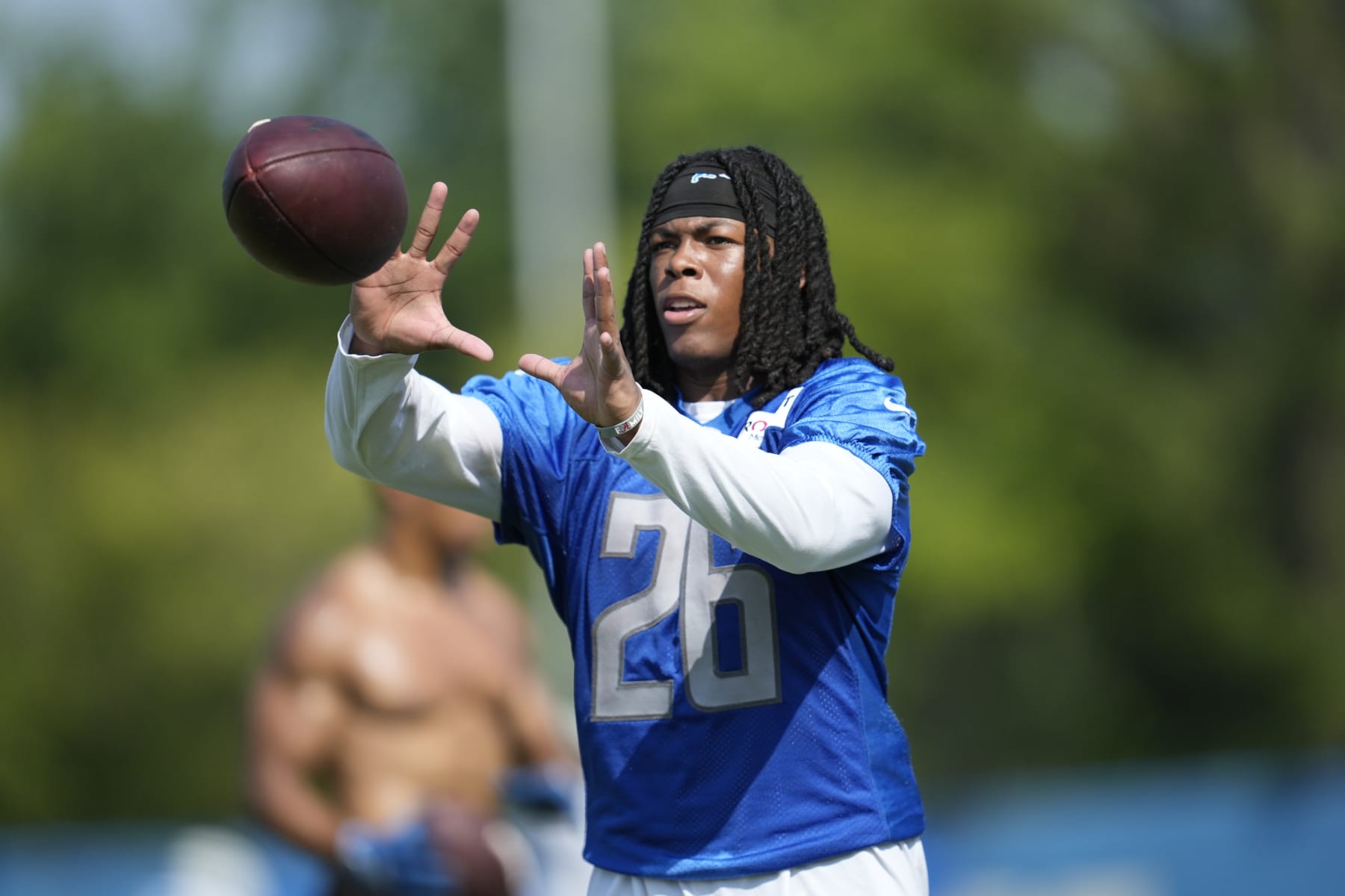 Detroit Lions running back Jahmyr Gibbs catches a pass during an NFL football practice in Allen Park, Mich., Monday, July 24, 2023. (AP Photo/Paul Sancya)
