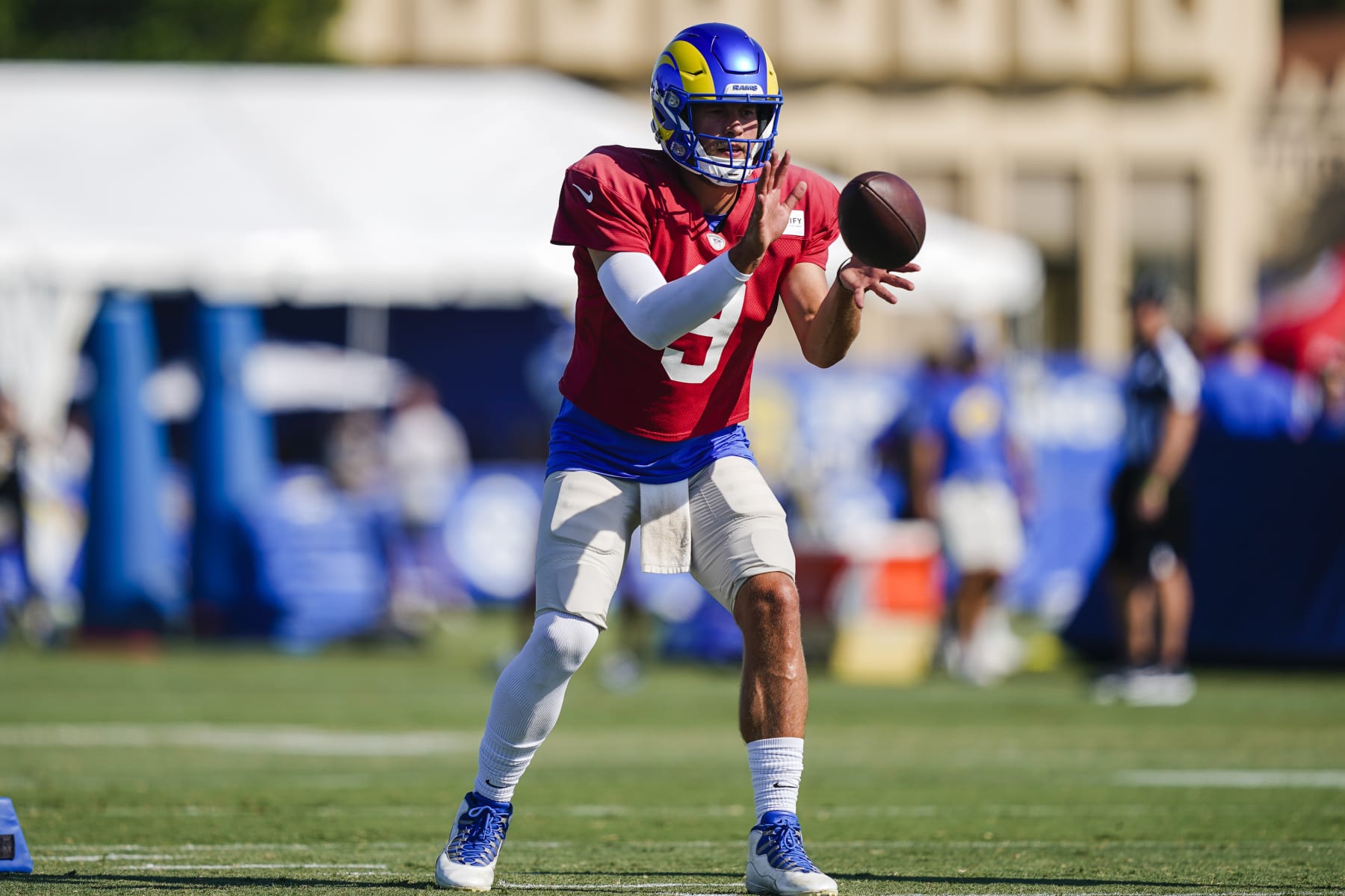 Los Angeles Rams quarterback Matthew Stafford participates in drills during the NFL football team's training camp, Tuesday, Aug. 1, 2023, in Irvine, Calif. (AP Photo/Ryan Sun)
