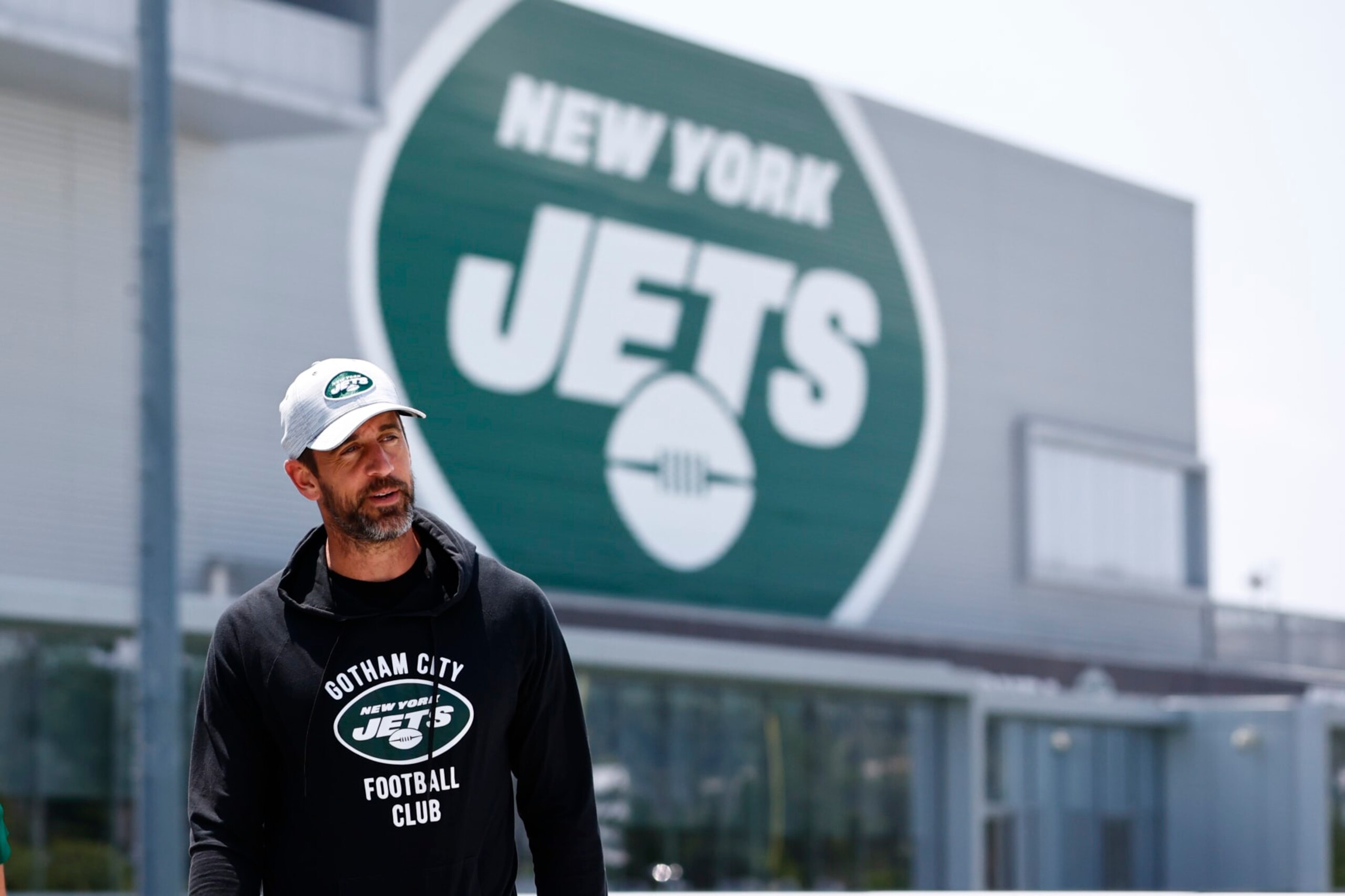 FLORHAM PARK, NEW JERSEY - JULY 26: Quarterback Aaron Rodgers #8 of the New York Jets walks to the media tent to talk to reporters after training camp at Atlantic Health Jets Training Center on July 26, 2023 in Florham Park, New Jersey. (Photo by Rich Schultz/Getty Images)