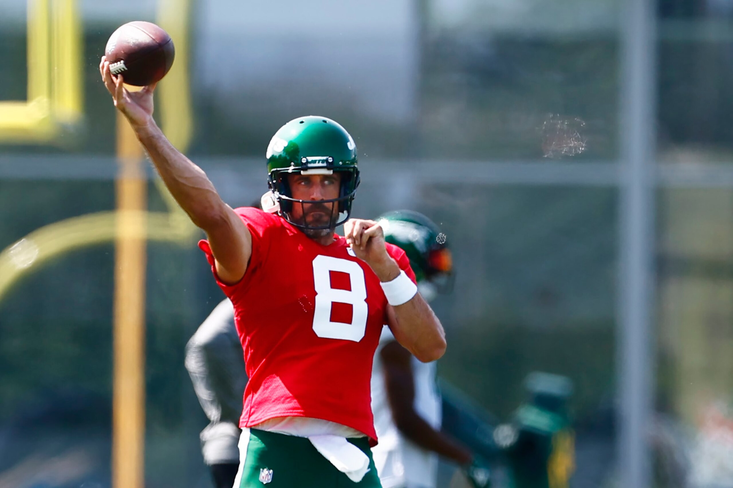 FLORHAM PARK, NEW JERSEY - JULY 26: Quarterback Aaron Rodgers #8 of the New York Jets attempts a pass during training camp at Atlantic Health Jets Training Center on July 26, 2023 in Florham Park, New Jersey. (Photo by Rich Schultz/Getty Images) FLORHAM PARK, NEW JERSEY - JULY 26: Quarterback Aaron Rodgers #8 of the New York Jets attempts a pass during training camp at Atlantic Health Jets Training Center on July 26, 2023 in Florham Park, New Jersey. (Photo by Rich Schultz/Getty Images)