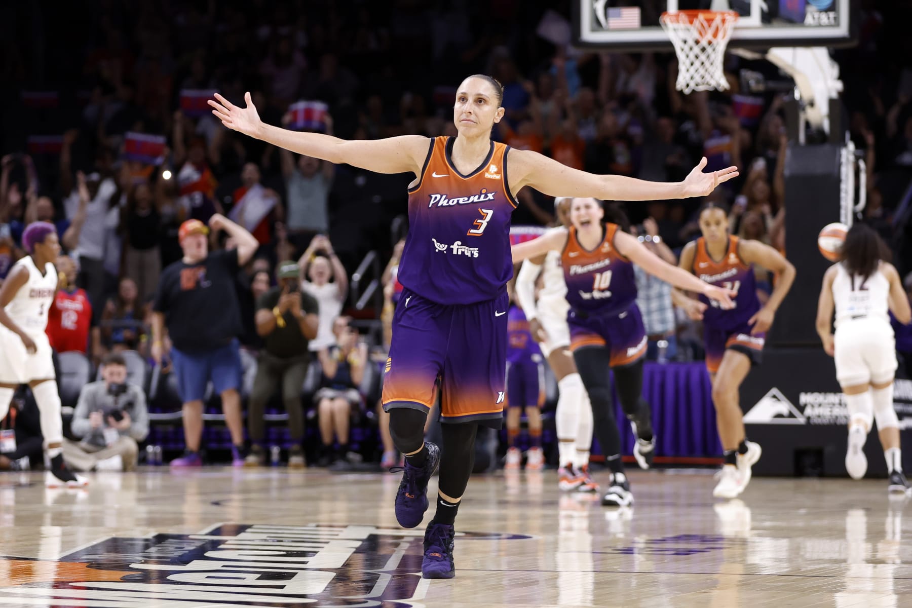 PHOENIX, ARIZONA - AUGUST 03: Guard Diana Taurasi #3 of the Phoenix Mercury reacts after scoring her 10,000th career point during the second half against the Atlanta Dream at Footprint Center on August 03, 2023 in Phoenix, Arizona. NOTE TO USER: User expressly acknowledges and agrees that, by downloading and or using this photograph, User is consenting to the terms and conditions of the Getty Images License Agreement.  (Photo by Chris Coduto/Getty Images)