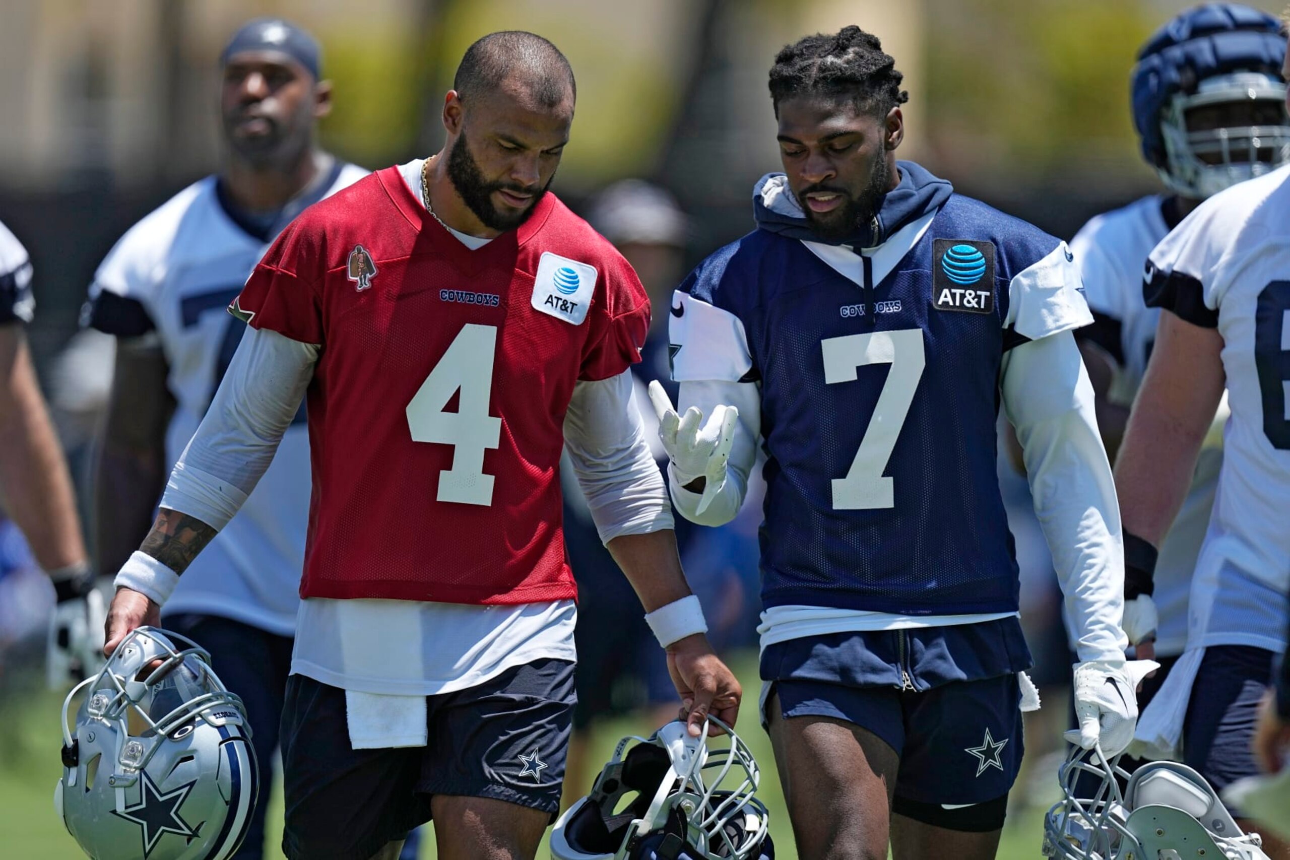 Dallas Cowboys quarterback Dak Prescott, left, and cornerback Trevon Diggs have a conversation during the NFL football team's training camp Wednesday, July 26, 2023, in Oxnard, Calif. (AP Photo/Mark J. Terrill) Dallas Cowboys quarterback Dak Prescott, left, and cornerback Trevon Diggs have a conversation during the NFL football team's training camp Wednesday, July 26, 2023, in Oxnard, Calif. (AP Photo/Mark J. Terrill)