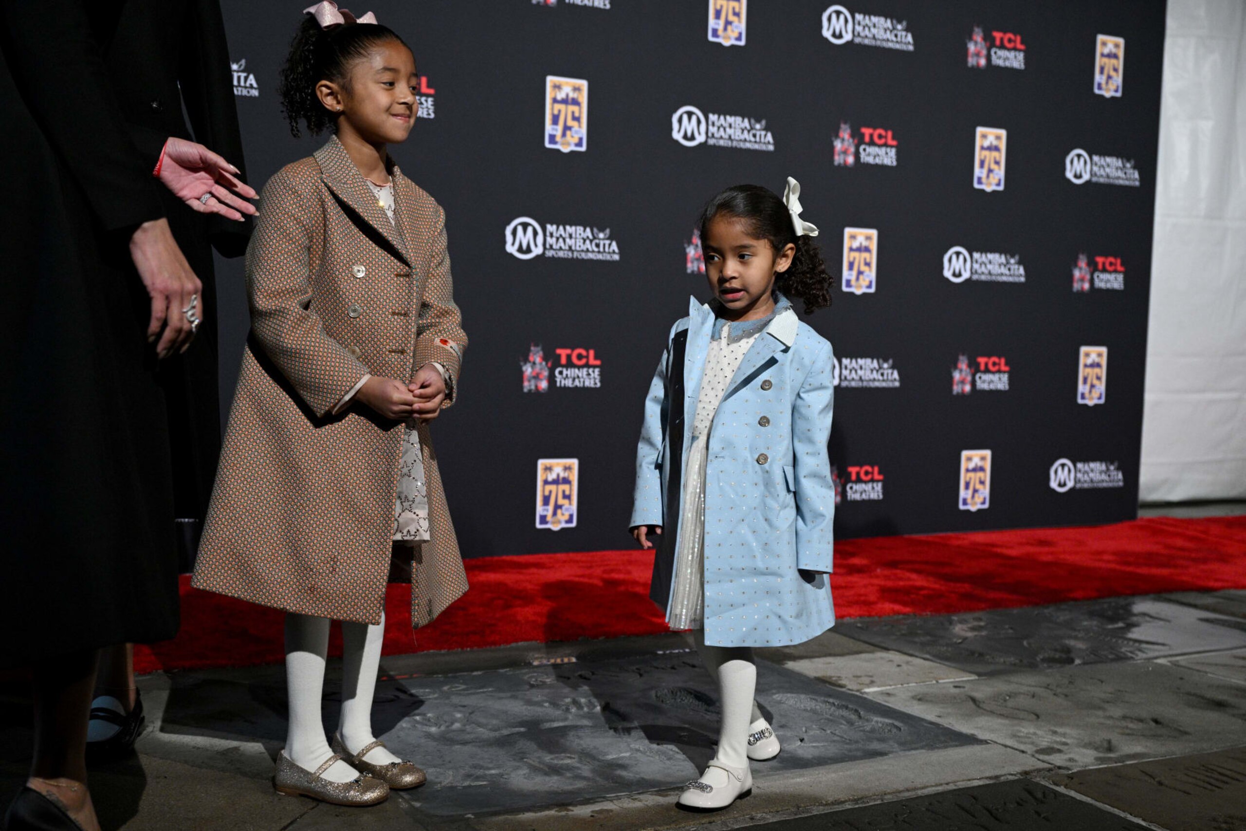 HOLLYWOOD, CALIFORNIA - MARCH 15: (L-R) Bianka Bryant, Capri Bryant attend a ceremony unveiling and permanently placing Kobe Bryant's hand and footprints in the forecourt of the TCL Chinese Theatre on March 15, 2023 in Hollywood, California. (Photo by Lionel Hahn/Getty Images)