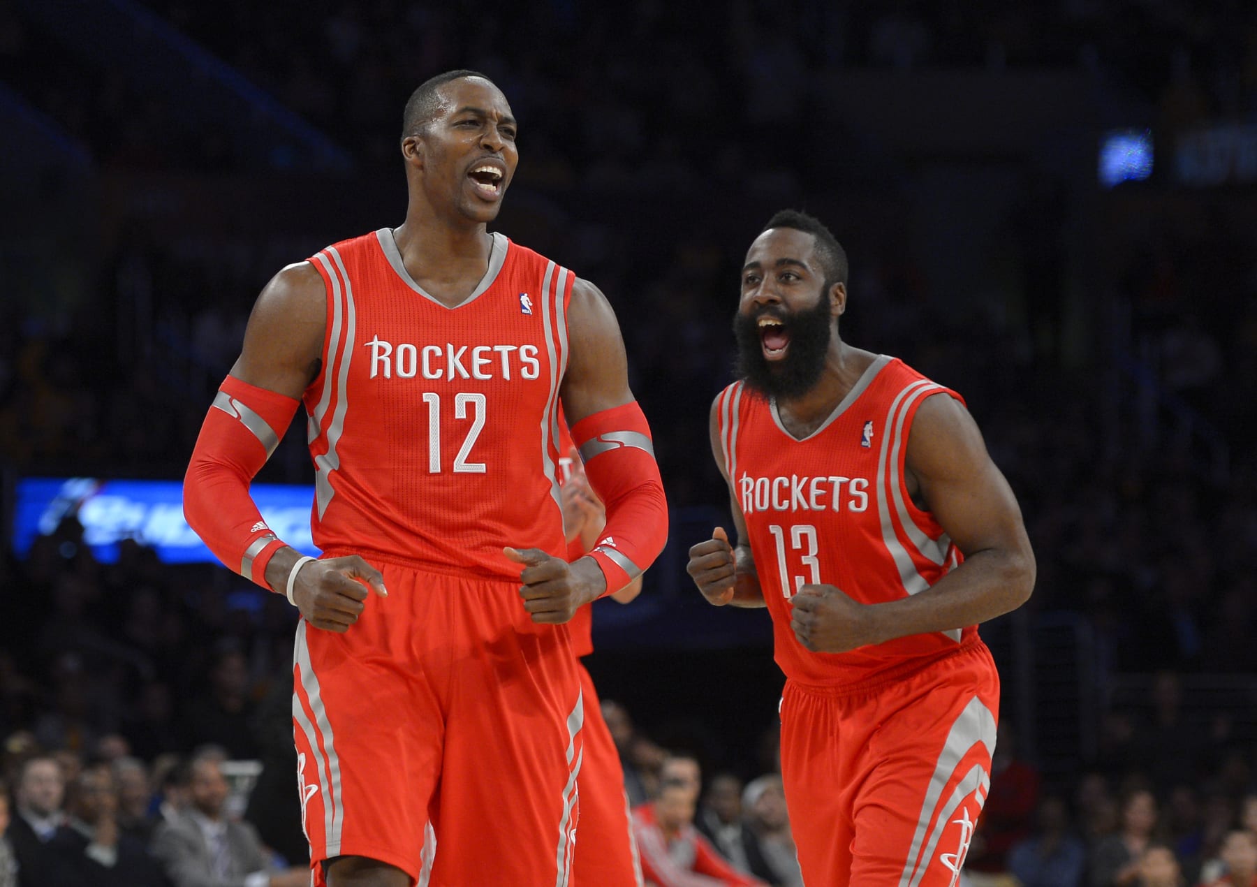 Houston Rockets center Dwight Howard, left, and guard James Harden reacts after Howard was called for a technical foul during the first half of an NBA basketball game against the Los Angeles Lakers, Wednesday, Feb. 19, 2014, in Los Angeles. (AP Photo/Mark J. Terrill)