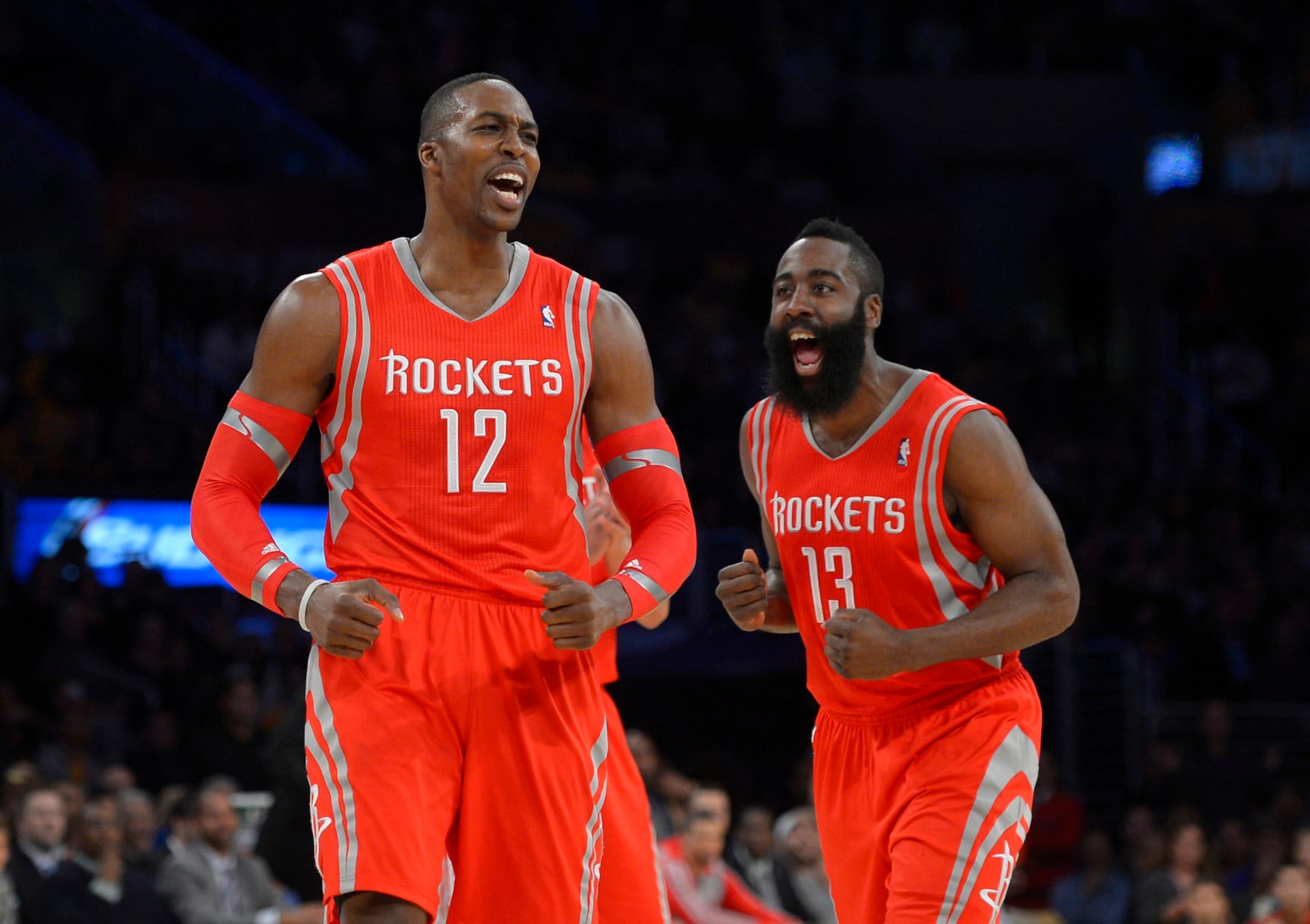 Houston Rockets center Dwight Howard, left, and guard James Harden reacts after Howard was called for a technical foul during the first half of an NBA basketball game against the Los Angeles Lakers, Wednesday, Feb. 19, 2014, in Los Angeles. (AP Photo/Mark J. Terrill)