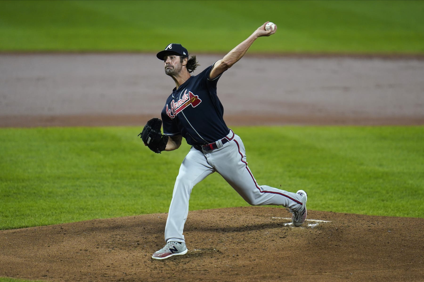 Atlanta Braves starting pitcher Cole Hamels throws a pitch to the Baltimore Orioles during the second inning of a baseball game, Wednesday, Sept. 16, 2020, in Baltimore. (AP Photo/Julio Cortez)