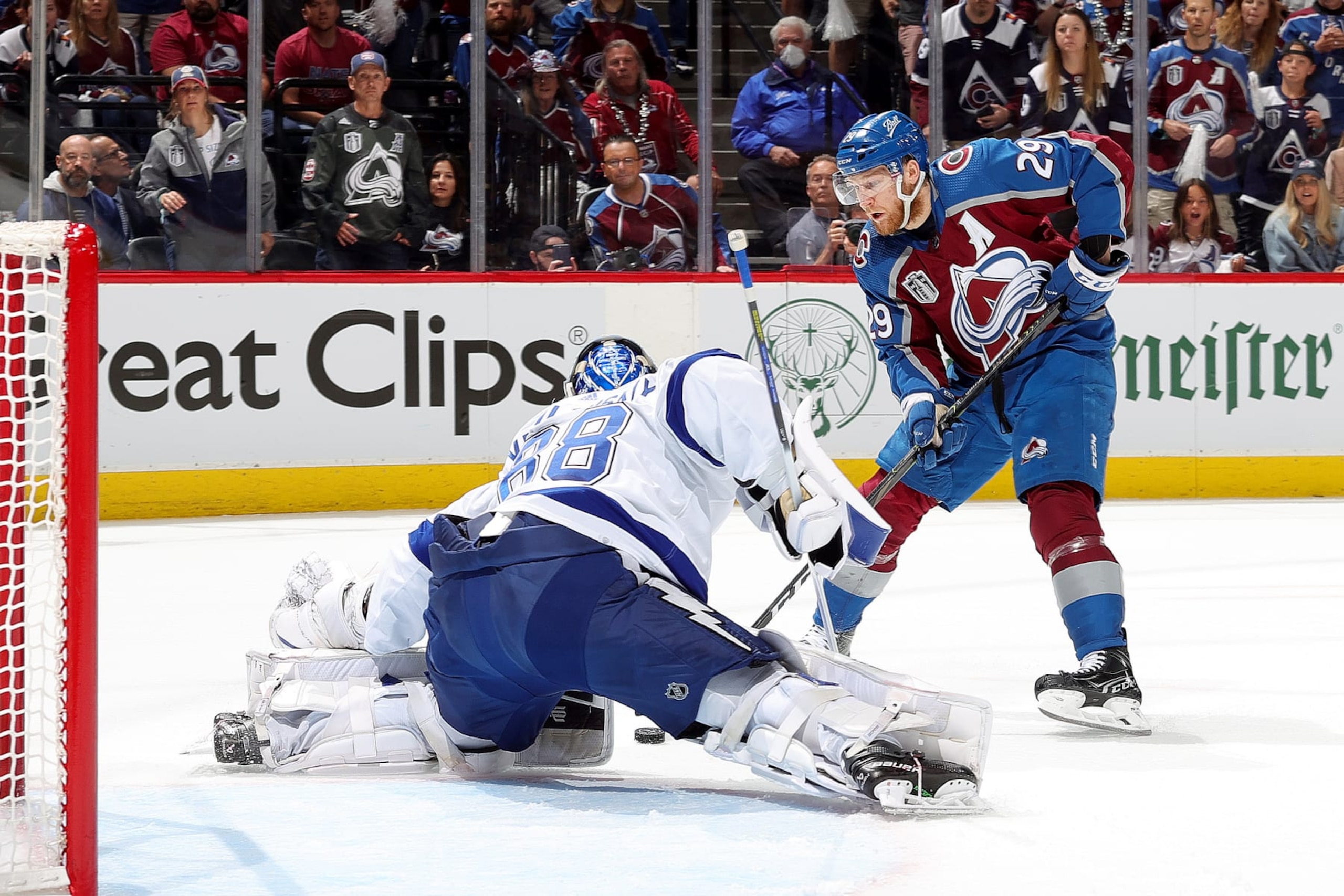 DENVER, COLORADO - JUNE 24: Nathan MacKinnon #29 of the Colorado Avalanche shoots against goaltender Andrei Vasilevskiy #88 of the Tampa Bay Lightning in Game Five of the 2022 Stanley Cup Final at Ball Arena on June 24, 2022 in Denver, Colorado. (Photo by Michael Martin/NHLI via Getty Images)