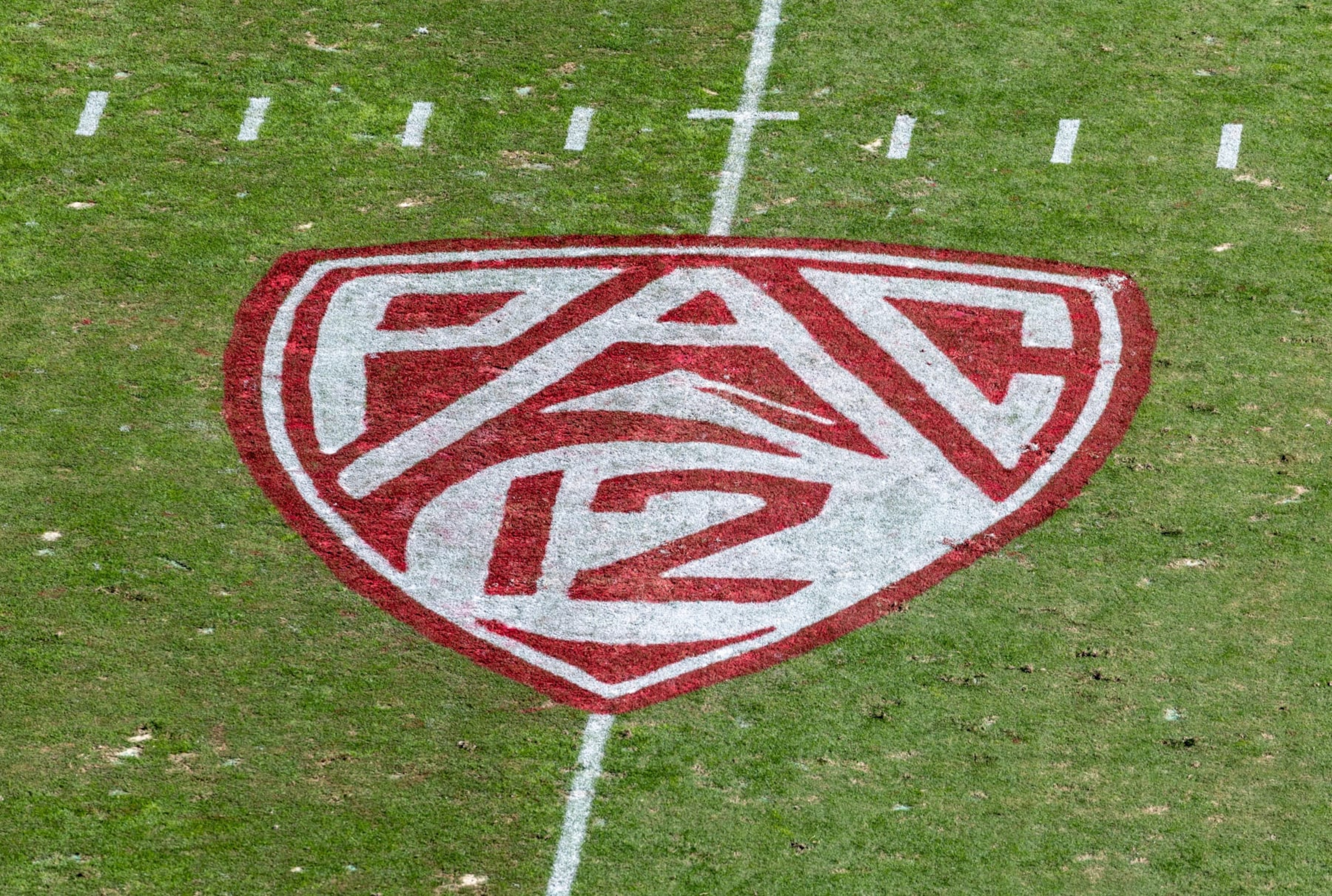 PALO ALTO, CA - OCTOBER 22:  A high angle view of the Pac-12 logo on the field at Stanford Stadium during an NCAA Pac-12 college football game between the Arizona State Sun Devils and the Stanford Cardinal on October 22, 2022 at Stanford Stadium in Palo Alto, California.  (Photo by David Madison/Getty Images)